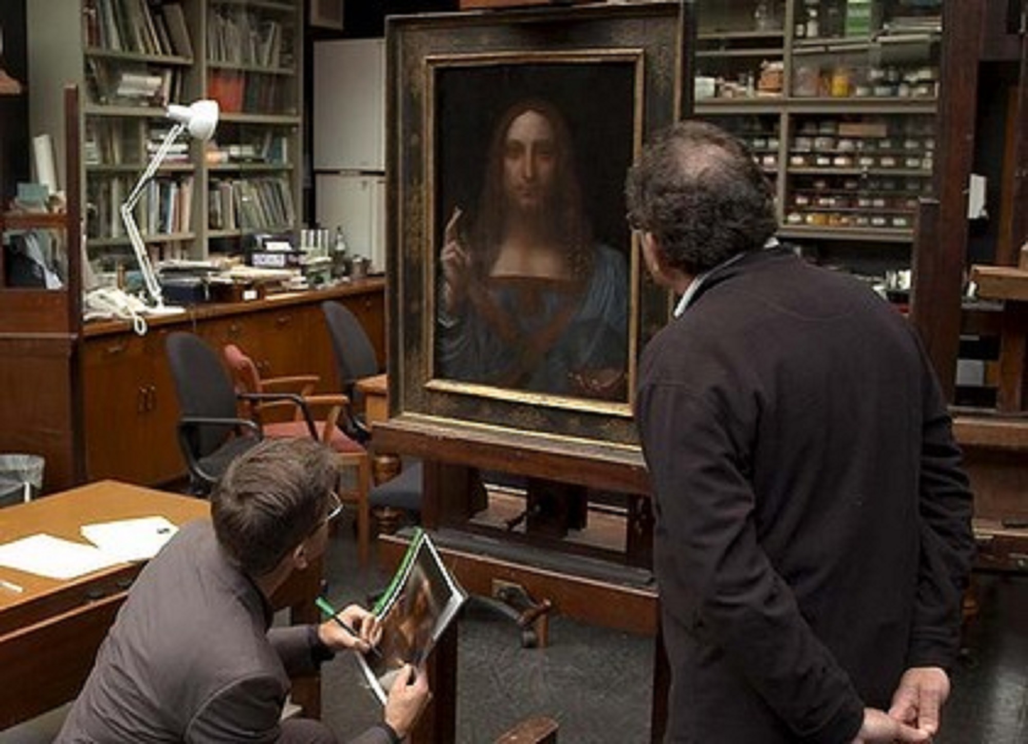 Right Robert Simon inspection of the Salvator Mundi at the National Gallery (2011).