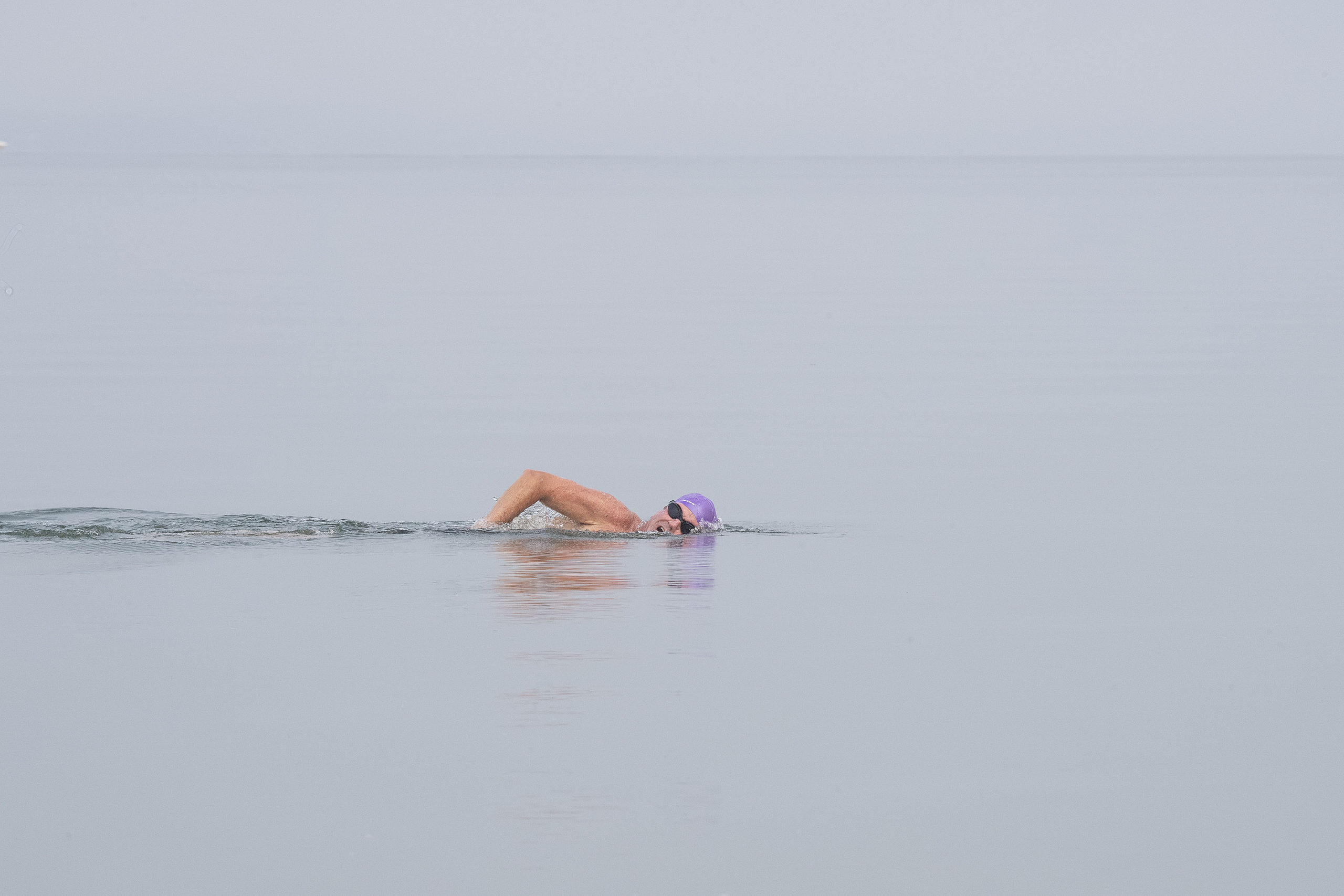 A competitor swims during the first leg of the Hamptons Young at Heart Triathlon, held at Long Beach in Sag Harbor on Saturday, July 17.