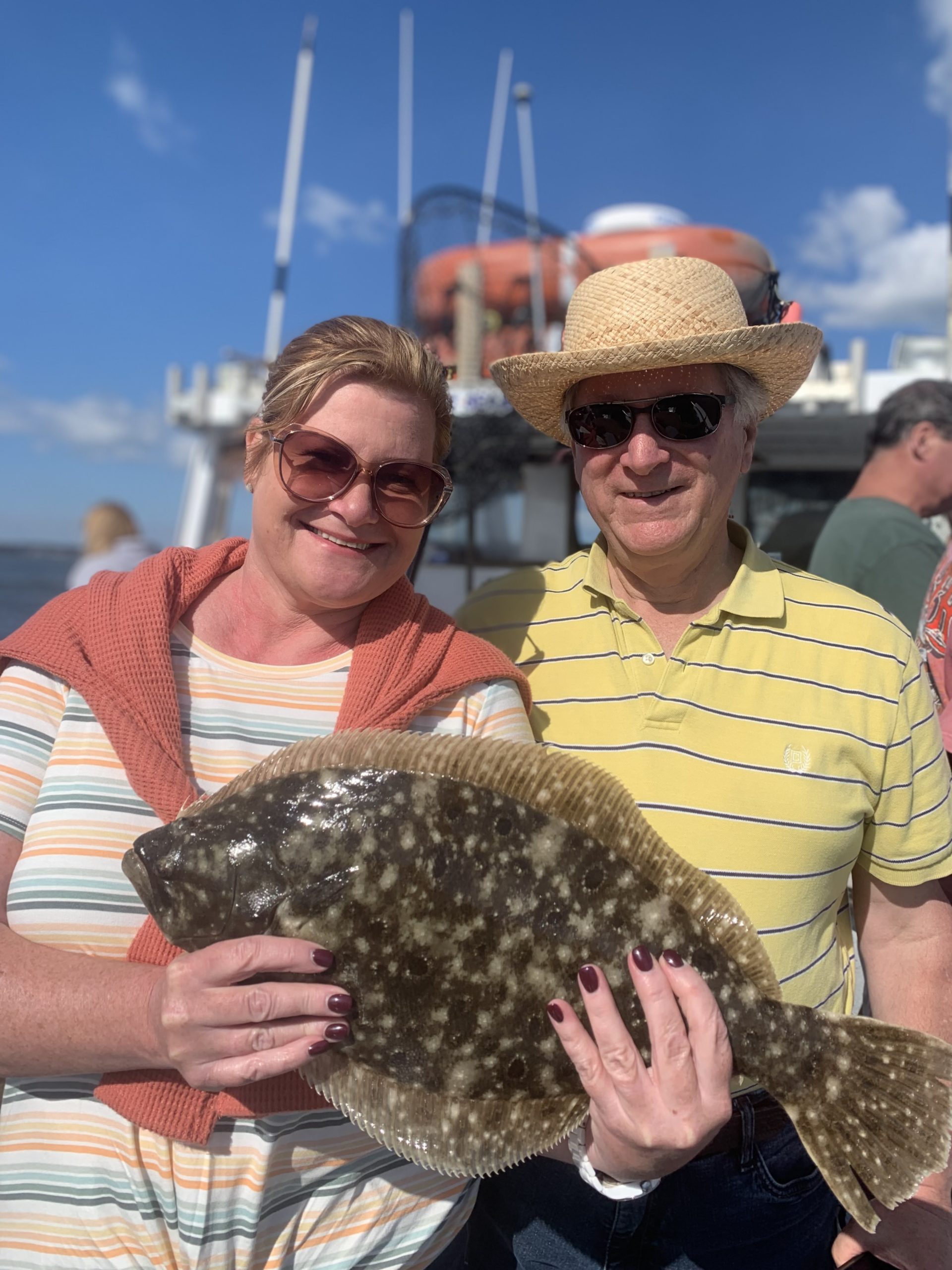 Ken and Kerry won the summer's best dressed award aboard the Shinnecock Star party boat out of Hampton Bays, and decked a few fluke too.
