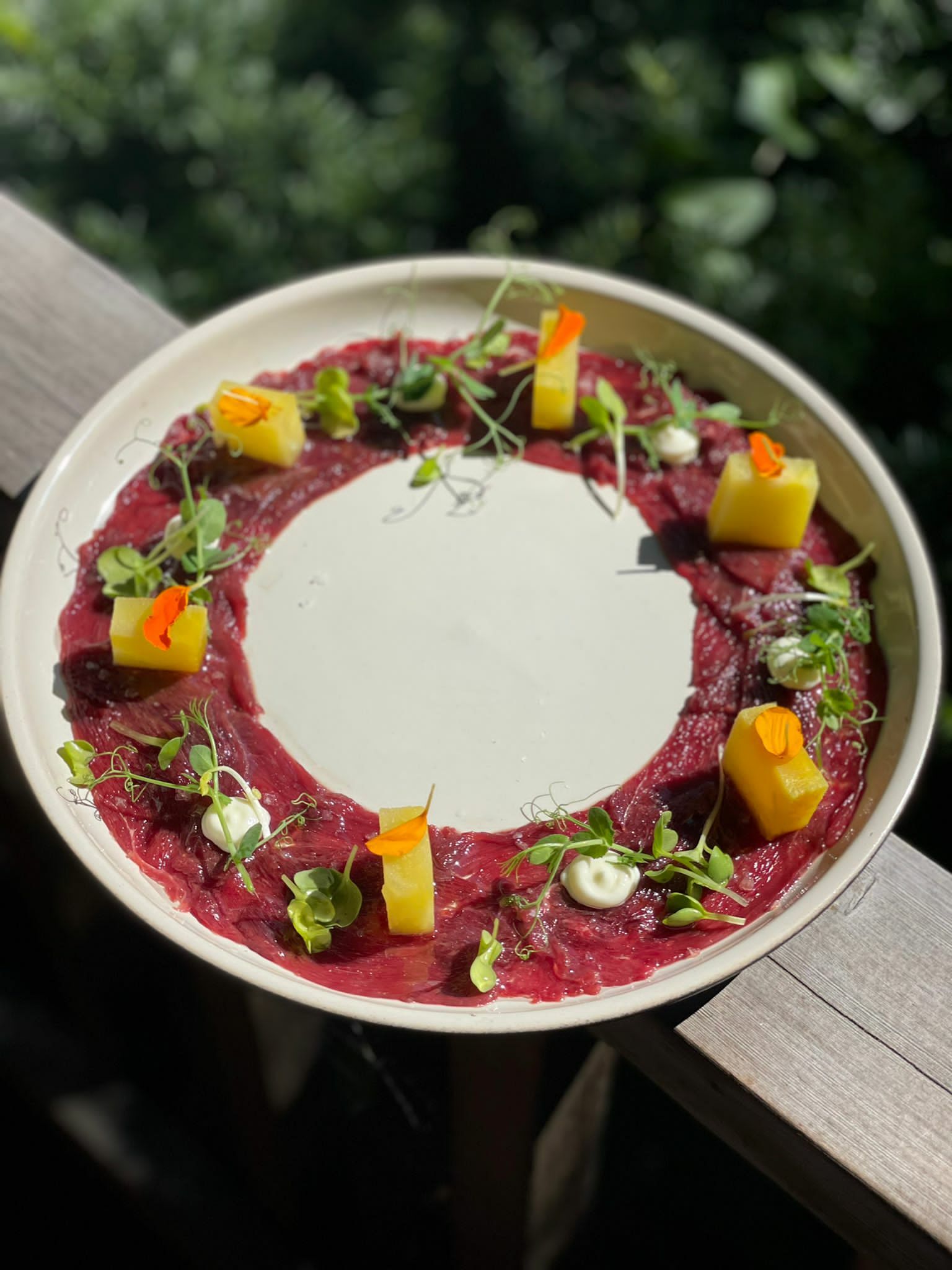 Jumping Carpaccio, featuring kangaroo, caviar and cucumber air, as part of the R.AIRE dining experience at The Hampton Maid in Hampton Bays.