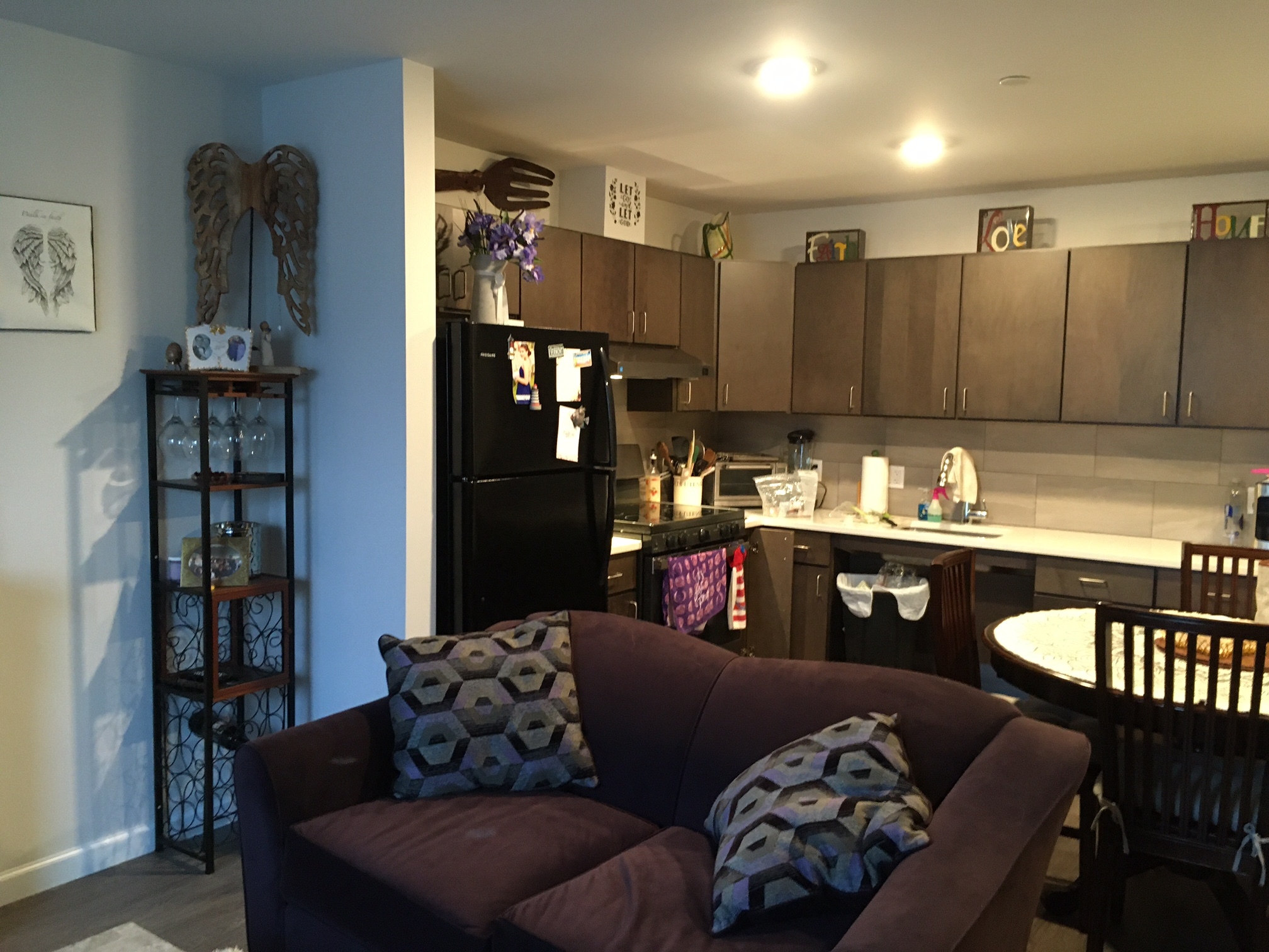 A cozy great room accommodates living and dining room and kitchen uses.