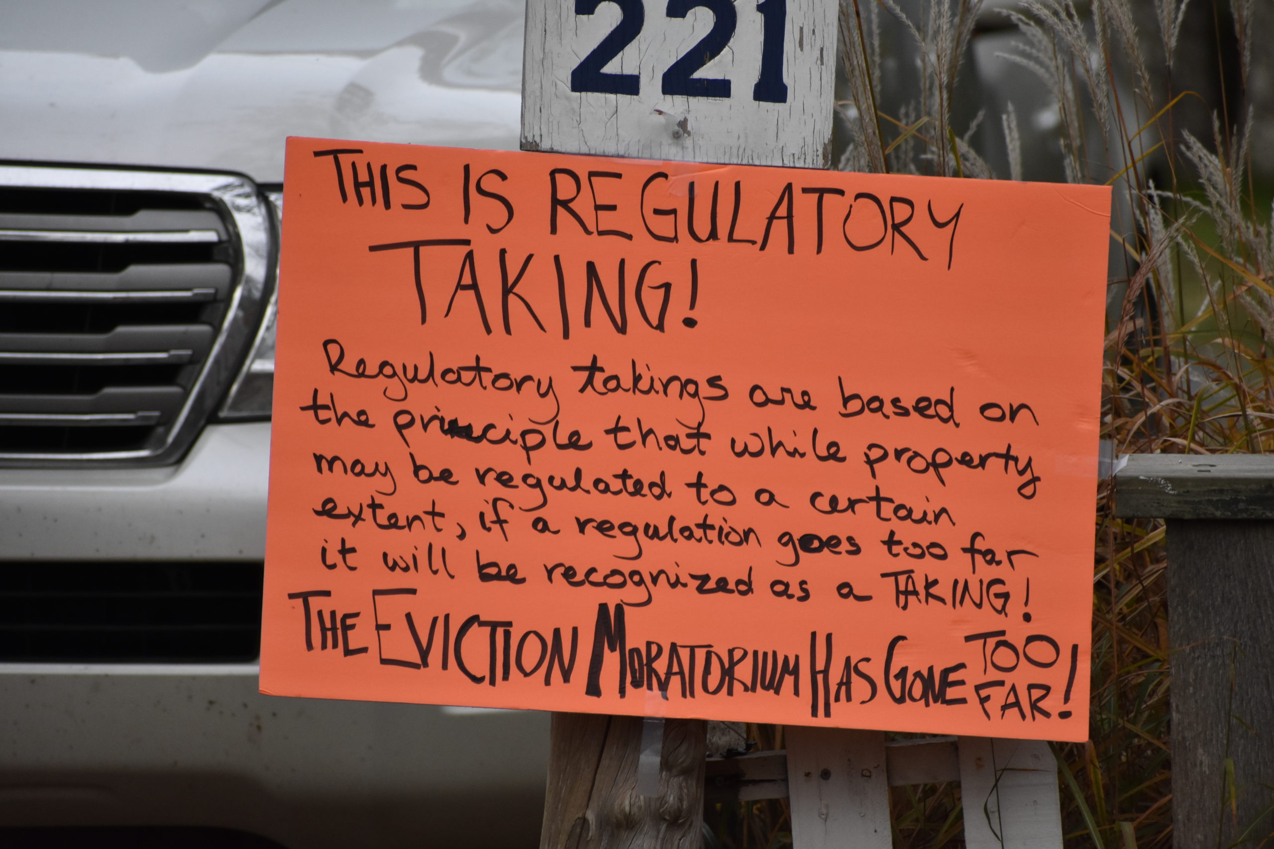 A sign posted outside Lynn Matsuoka's home denounces the eviction moratorium.