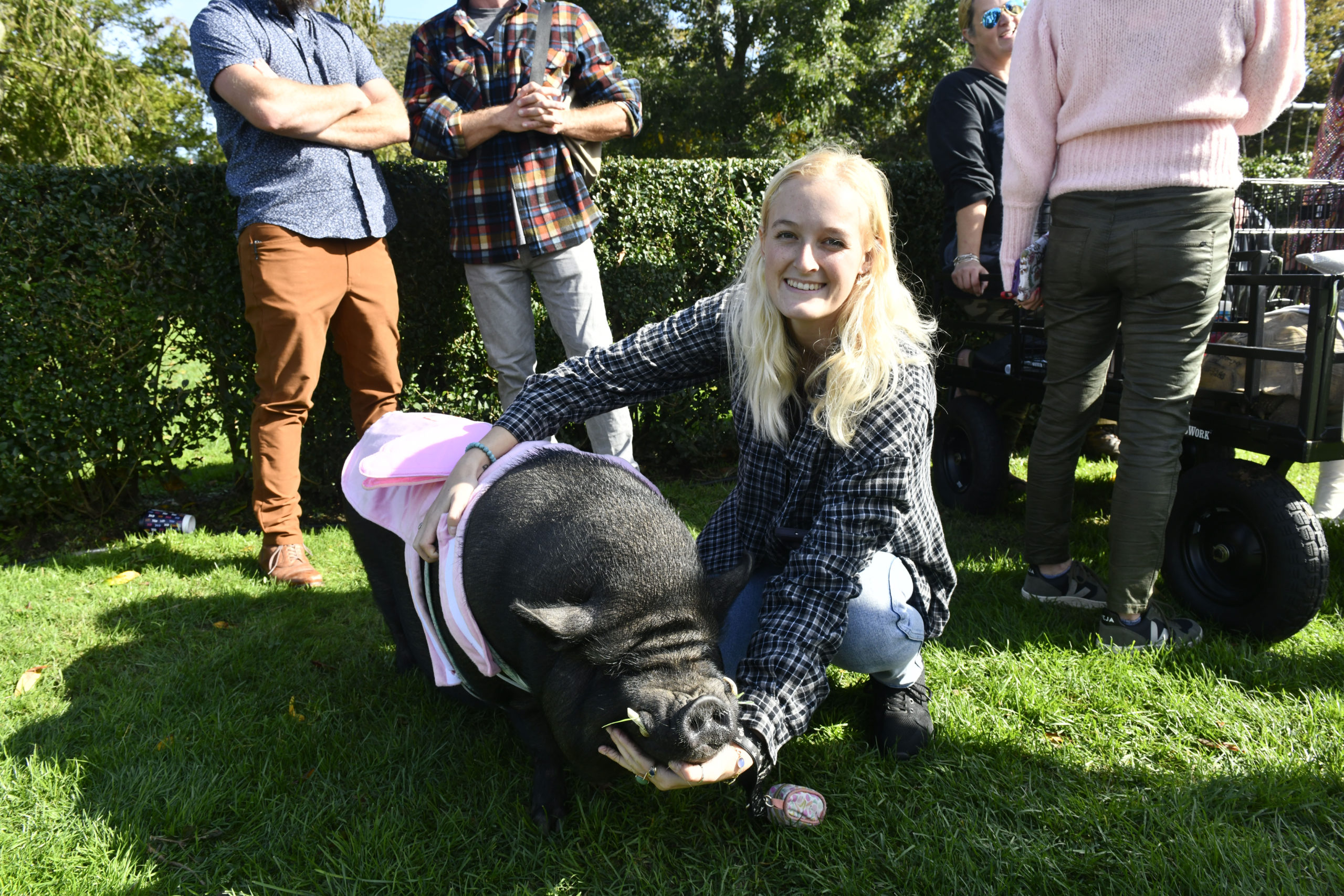 Ivy Wilson with Yummy the pig in Agawam Park in Southampton for the Little Lucy's Pet Parade.  DANA SHAW
