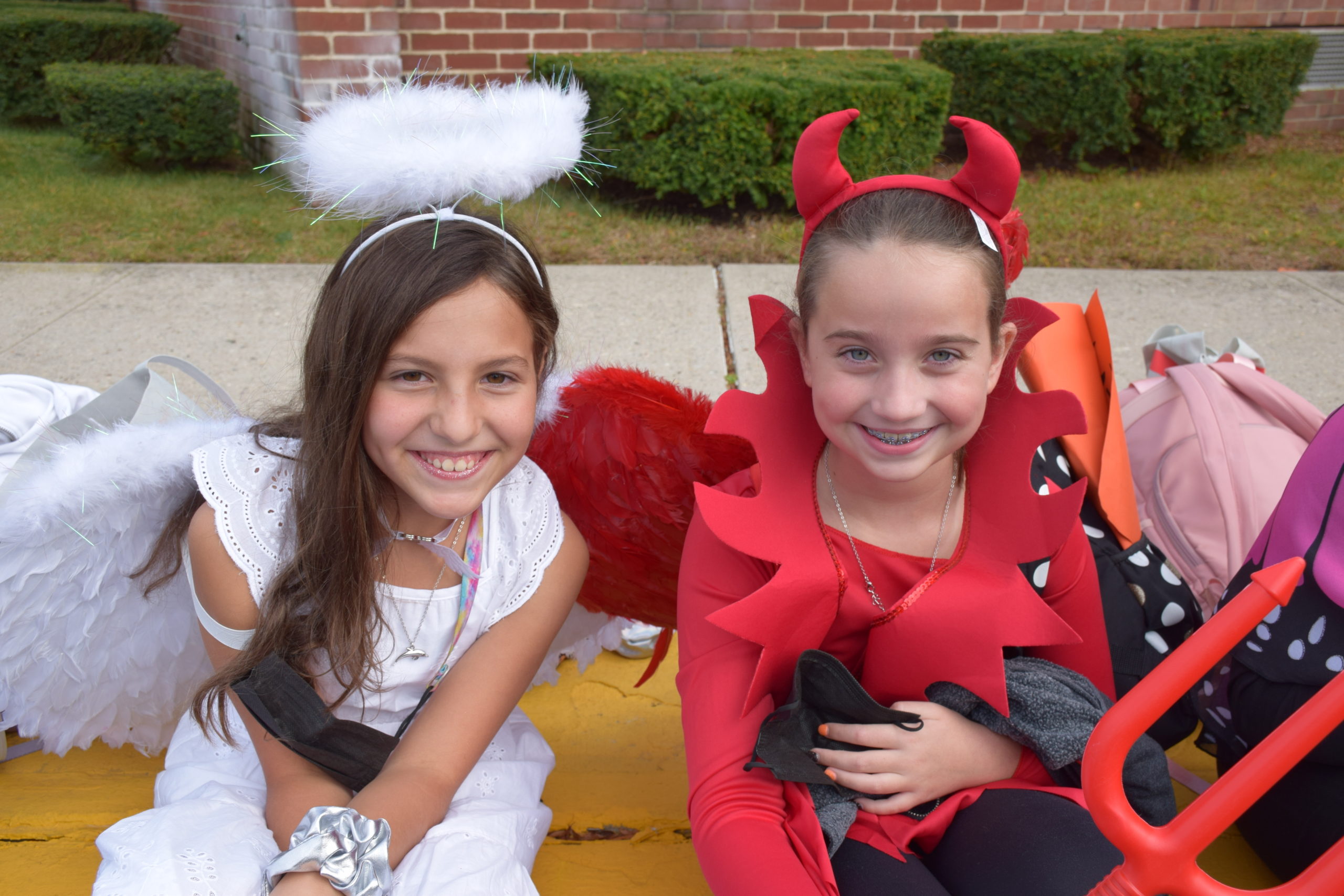 Wearing bright smiles and colorful costumes, Hampton Bays Elementary School students paraded around the school’s bus loop on October 29 for the school’s annual Harvest Parade. A crowd of onlookers cheered as the students — dressed as princesses, superheroes and spooky characters — marched and waved as the sounds of traditional Halloween music played in the background.