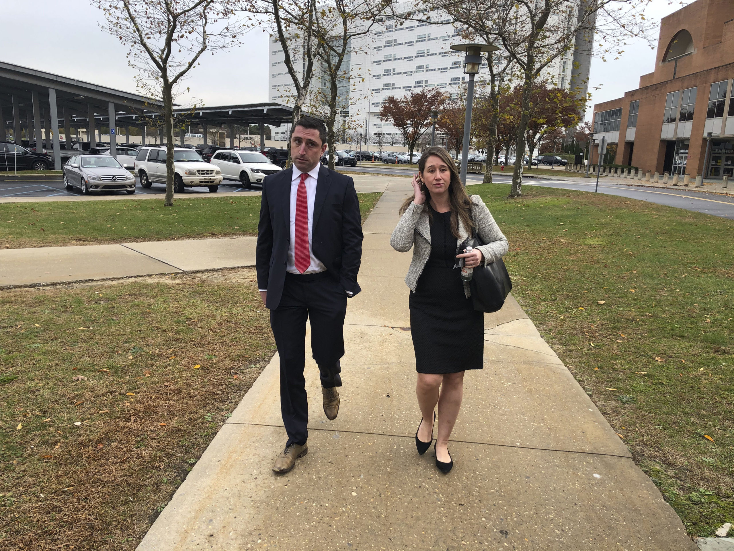 Amos Goodman with his attorney Lindsay Lewis at the Suffolk County Court in Central Islip on Monday.   T.E. MCMORROW
