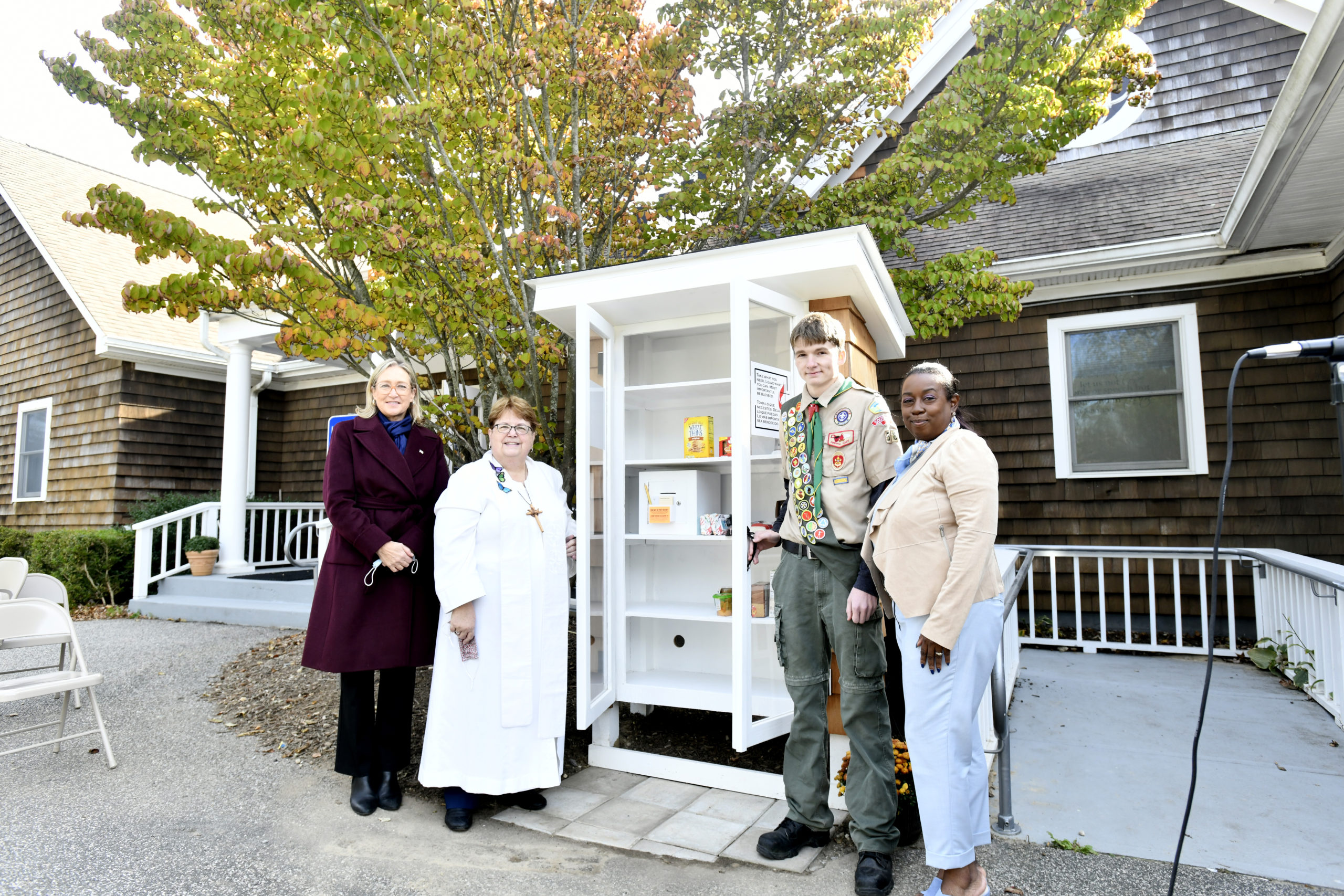 Suffolk County Legislator Bridget Fleming, Rev. Joanne S. Utley, Eagle Scout Jagger Maddock and Southampton Village Trustee Robin Brown  at the dedication of the new “Blessing
Box,” micro food pantry on Sunday at the Hamptons United Methodist Church in Southampton. Jagger Maddock constructed this “micro food pantry” as an Eagle Scout project, with the help of the leaders and other scouts of Troop 58.   DANA SHAW