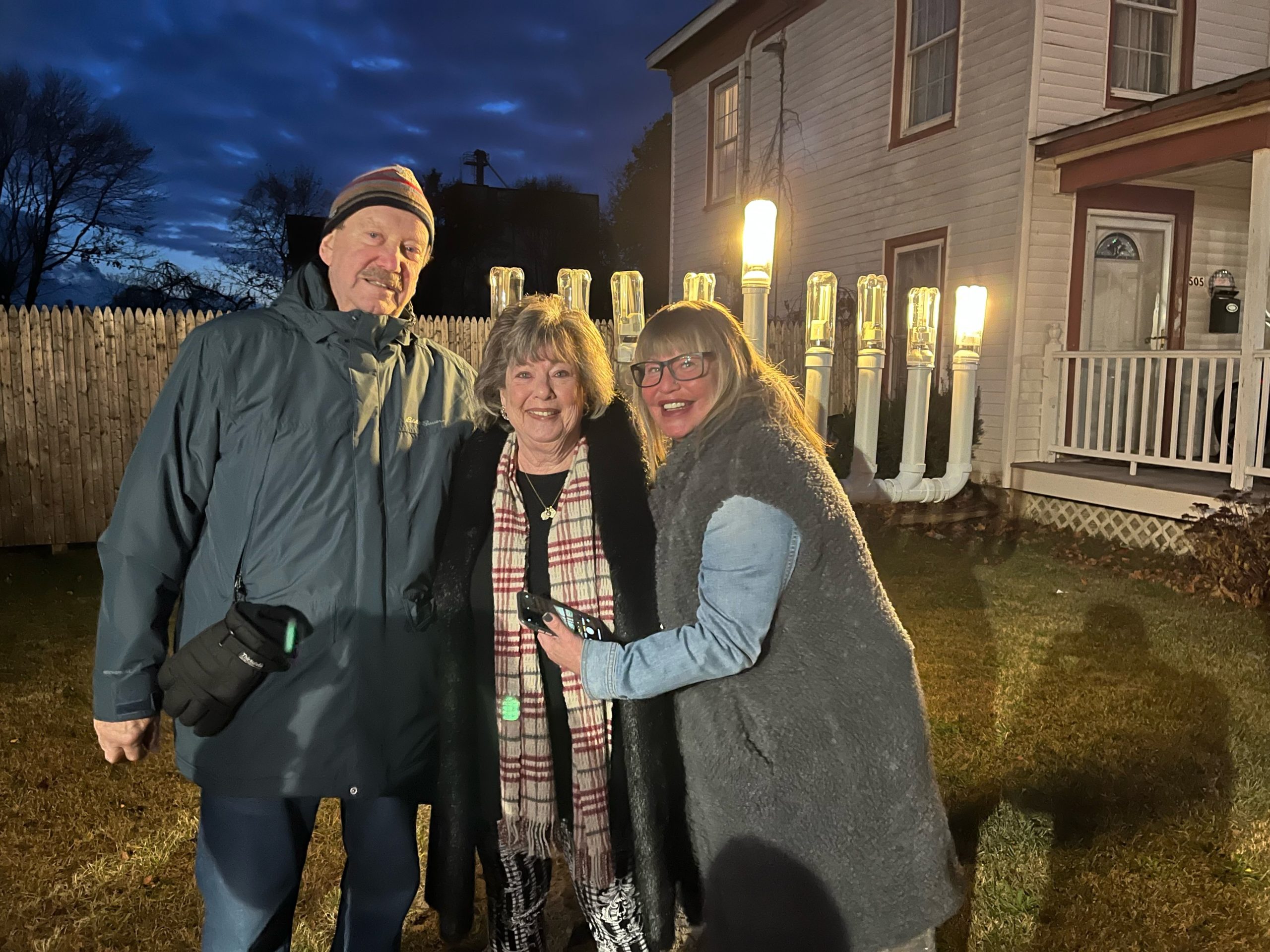 The Eastport Chamber of Commerce held its very first menorah lighting on November 28. The menorah was handmade by David and Marlene Sharinn, who were at the lighting with their daughter Ilene. A public lighting will take place on December 4.