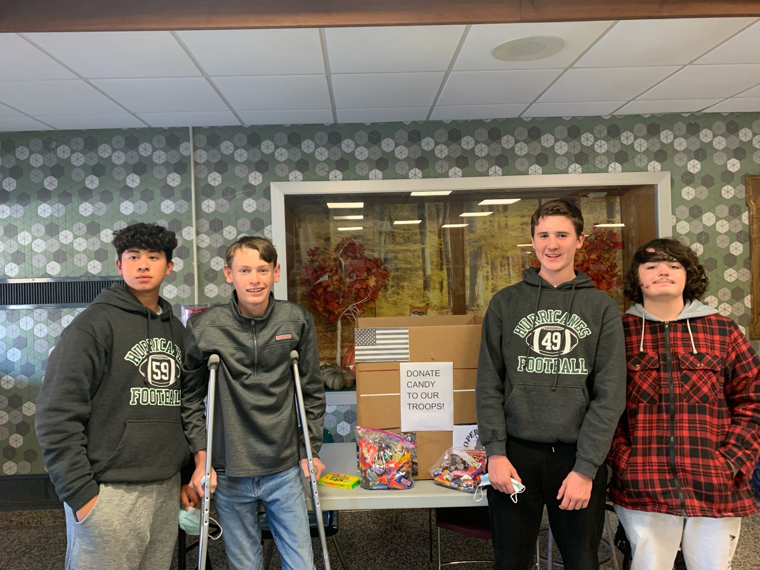 Members of the Westhampton Beach High School ninth grade student government, from left, David Salazar, Joseph Emiddio, Nicolas Warchol and Curtis Barczak collected Halloween candy from their peers to donate to the military and local first responders.