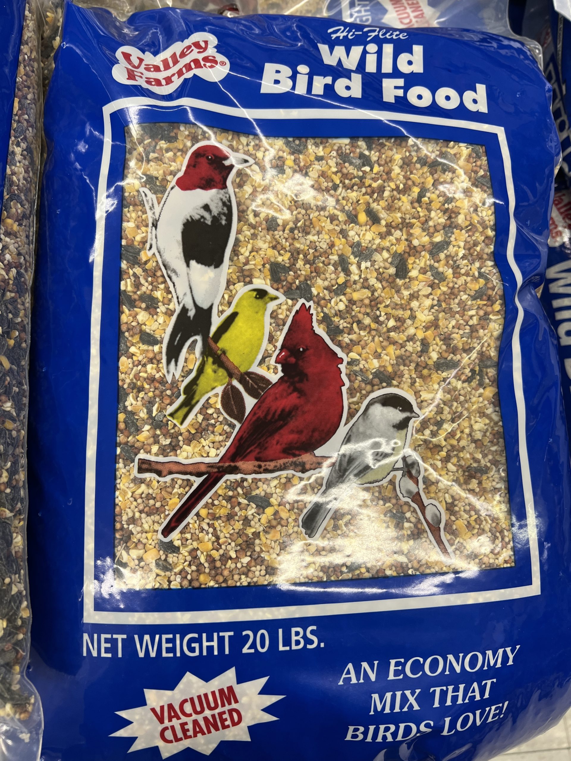Beware of economy bird seed mixes. They cost much less, but contain many types of seeds that the birds will simply let drop to the ground.