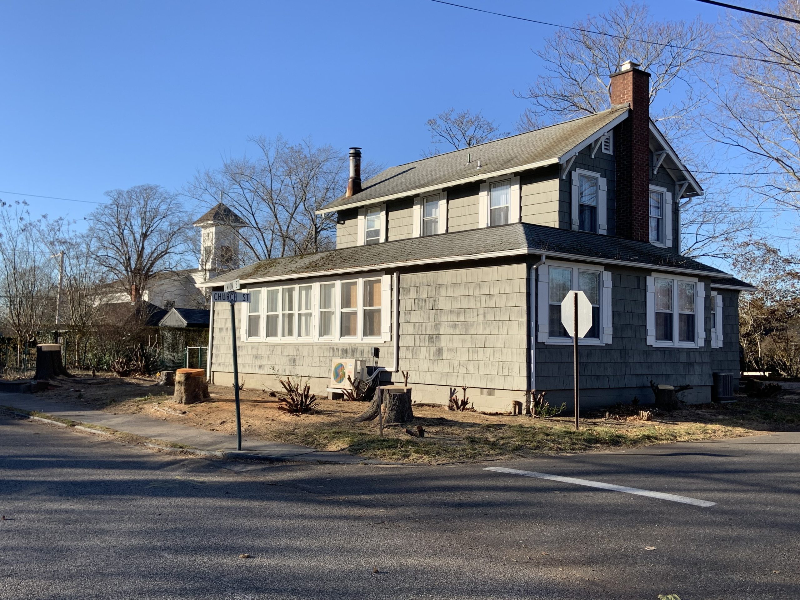 Even though it was approved by Sag Harbor Village, the removal of every tree and shrub from this property at the corner of Union and Church Streets has drawn responses ranging from anguish to anger. STEPHEN J. KOTZ