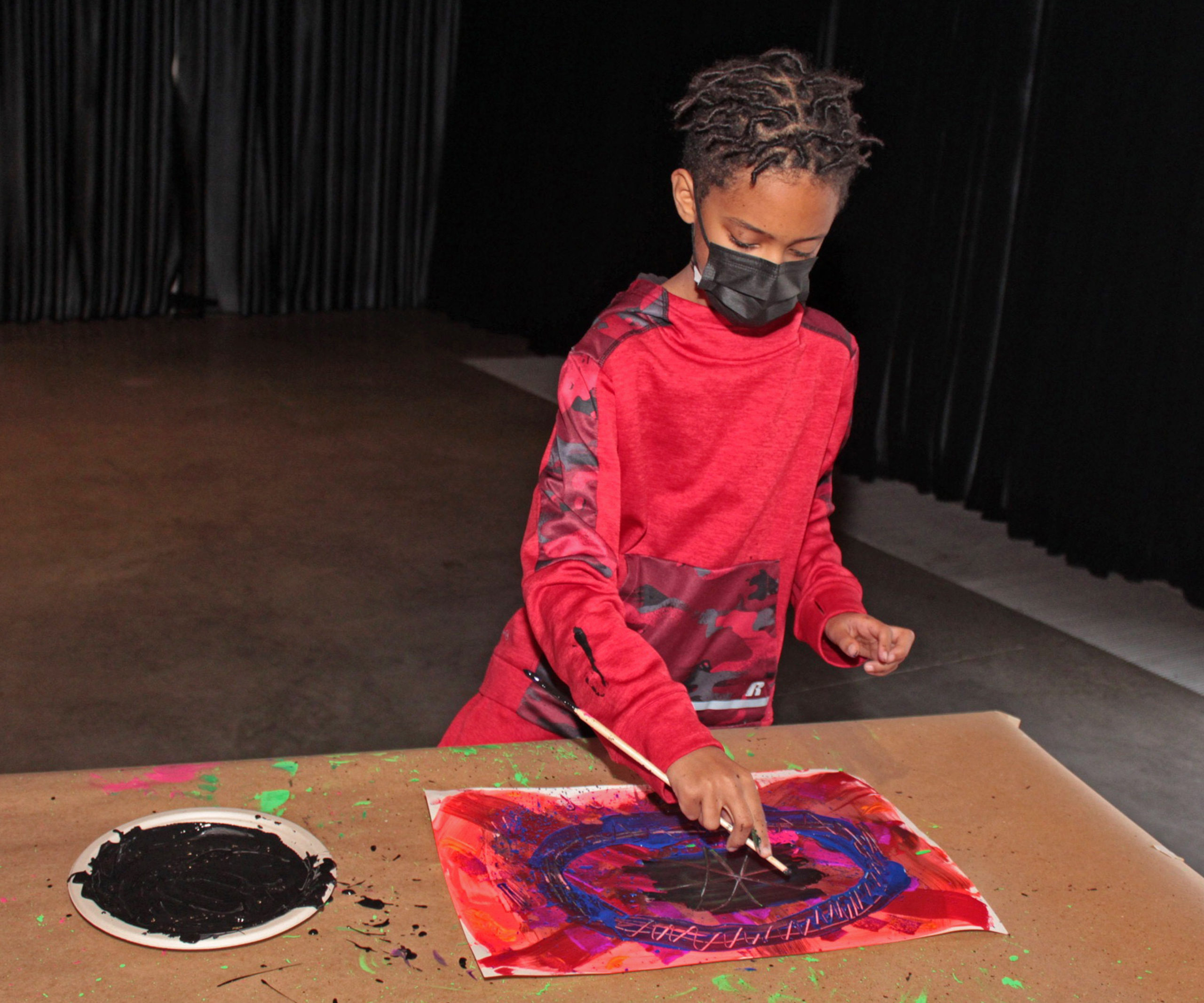 A student works on an artwork during 
