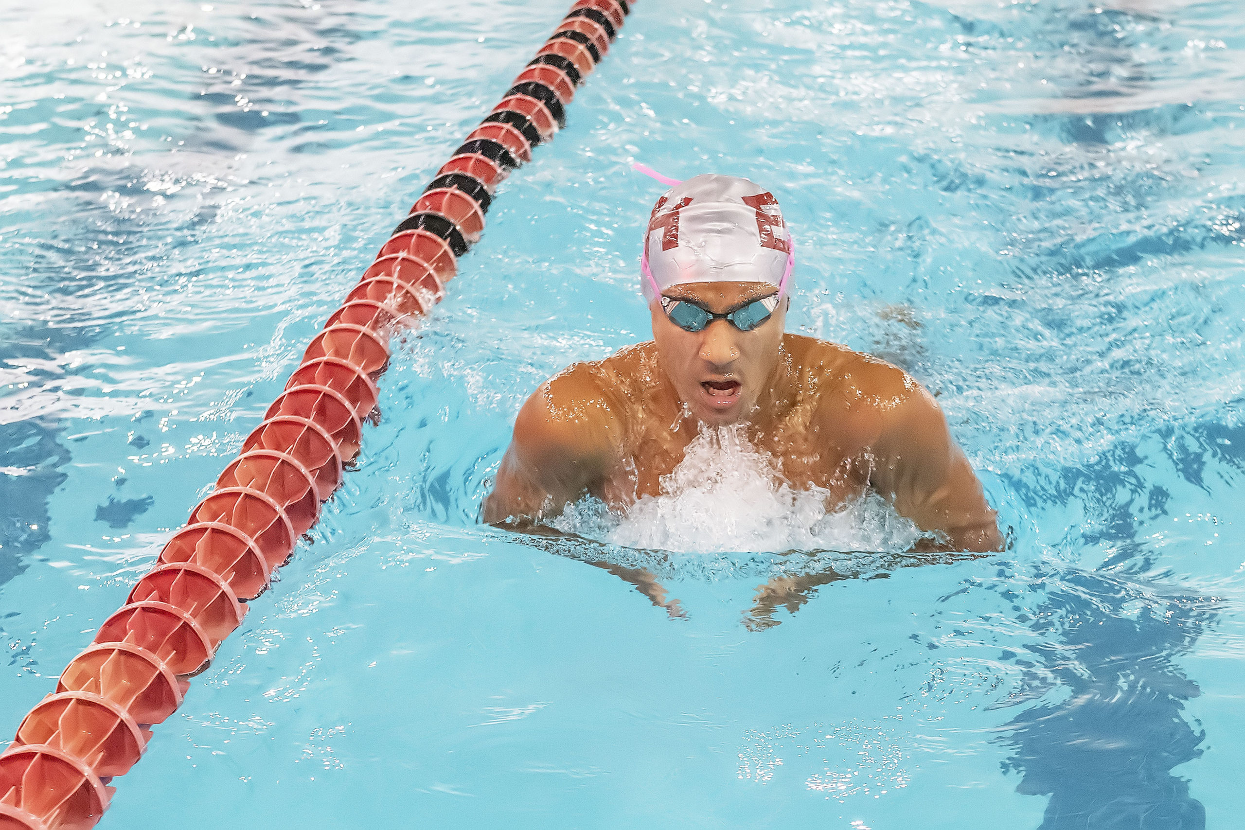 East Hampton's Tenzin Tamang swims his breaststroke portion of the 200-yard individual medley.