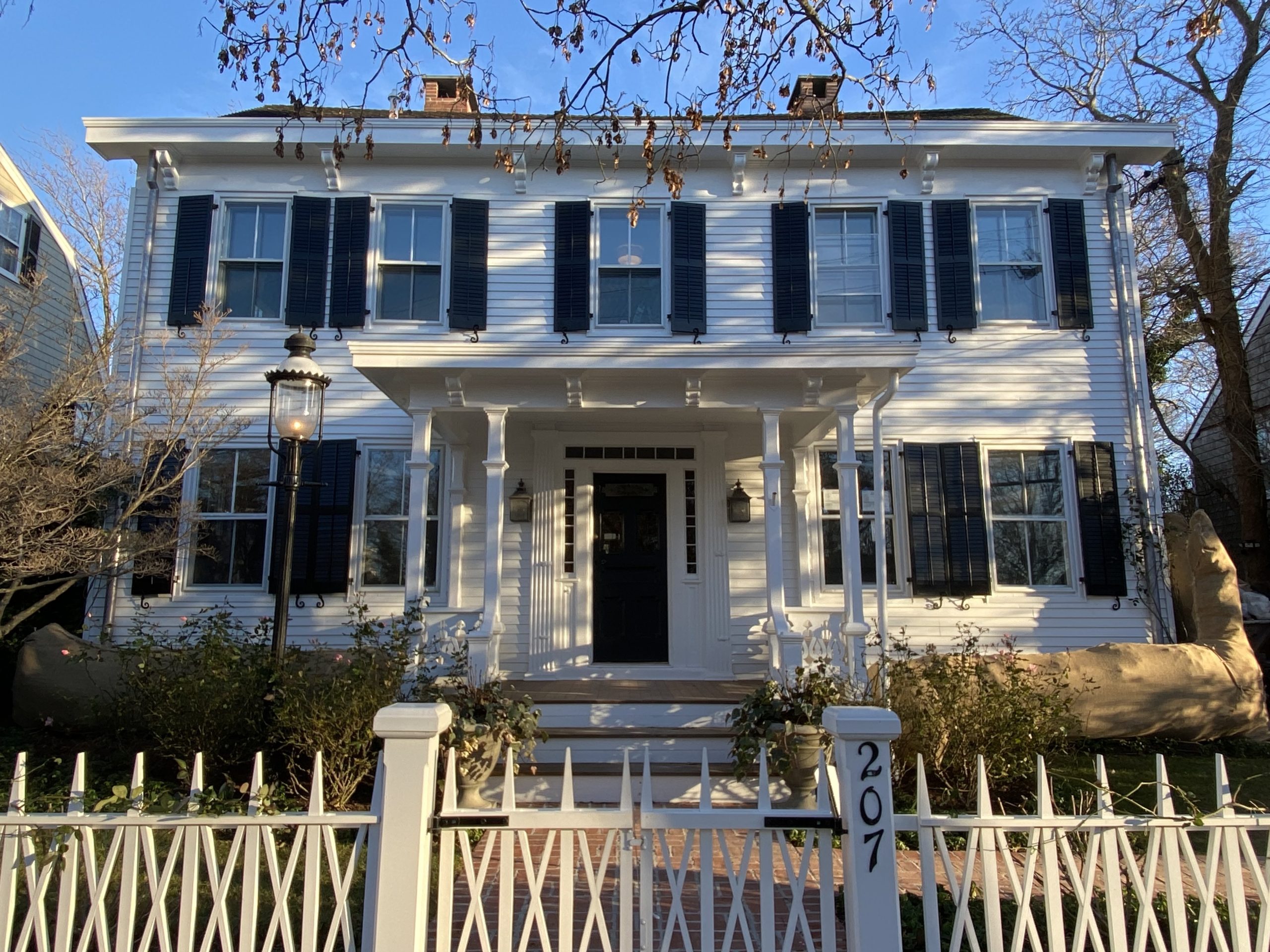 The late 18th-century house at 207 Main Street in Sag Harbor, the old 2-over-2 windows of which are a point of conflict in a case before the vilage’s Historic Preservation and Architectural Review Board.    Peter Boody photo