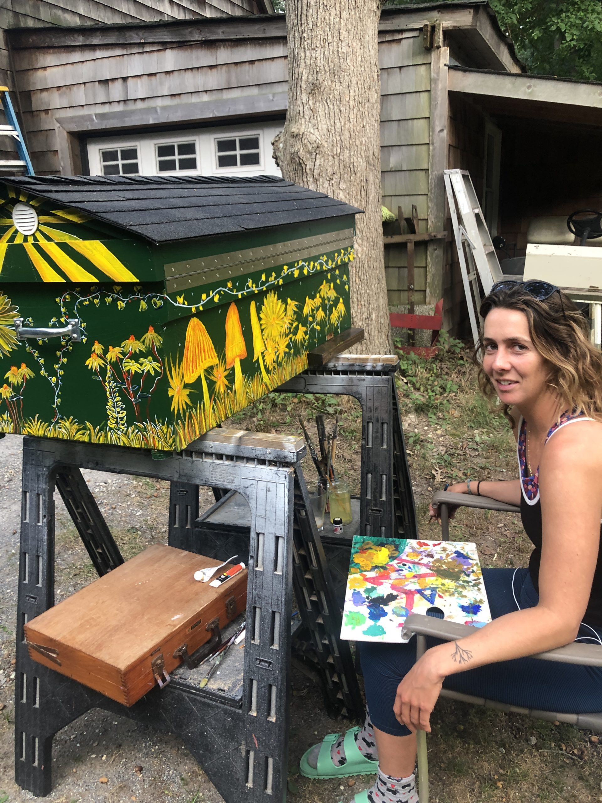 Allison O’Connor working her magic on a new hive.