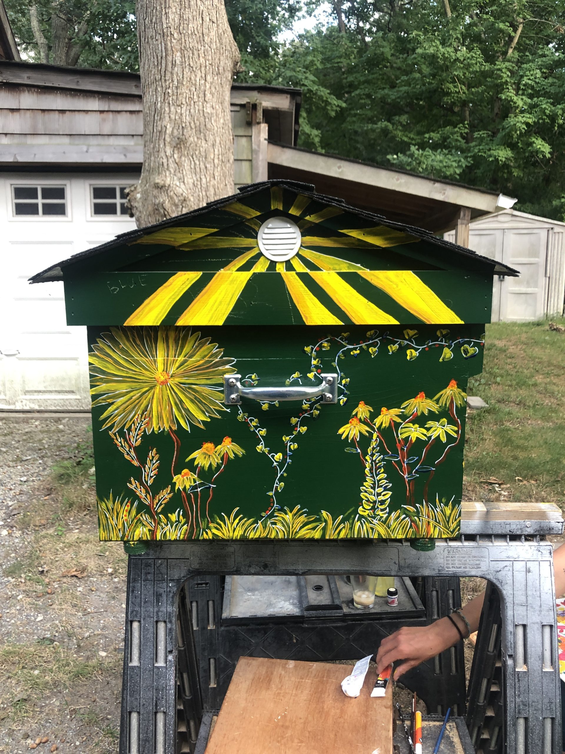 The Langstroth long hive offers a broad canvas for bee-friendly art.