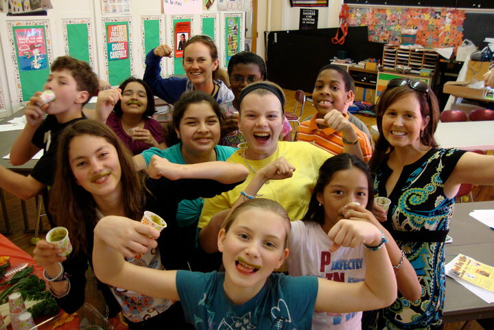 Jennifer Taylor of the Wellness Foundation, right, with the first class of WKids at the John Marshall Elementary School in East Hamopton. COURTESY WELLNESS FOUNDATION
