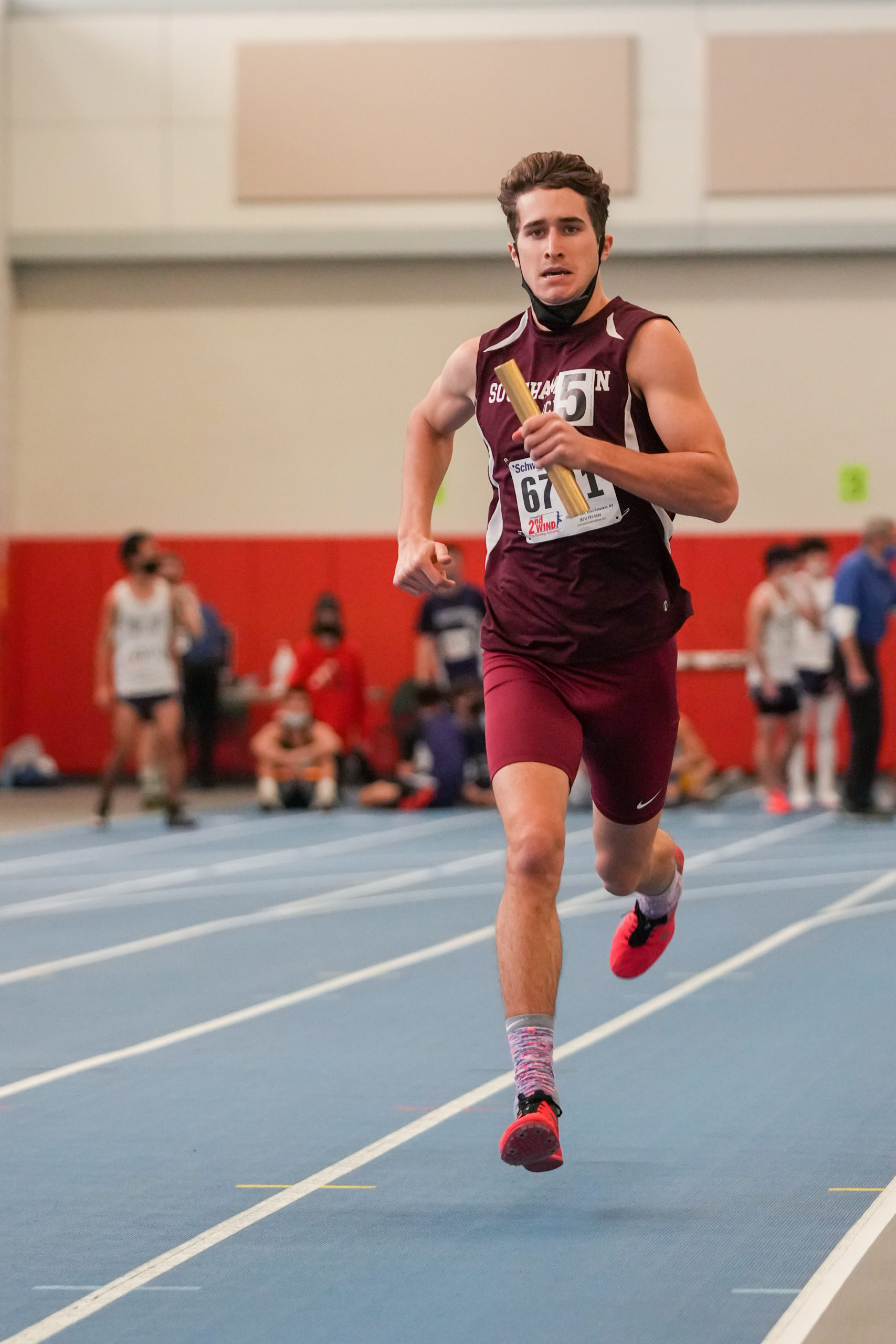 Billy Malone comes down the final stretch to bring home the League V 4x400-meter relay title.