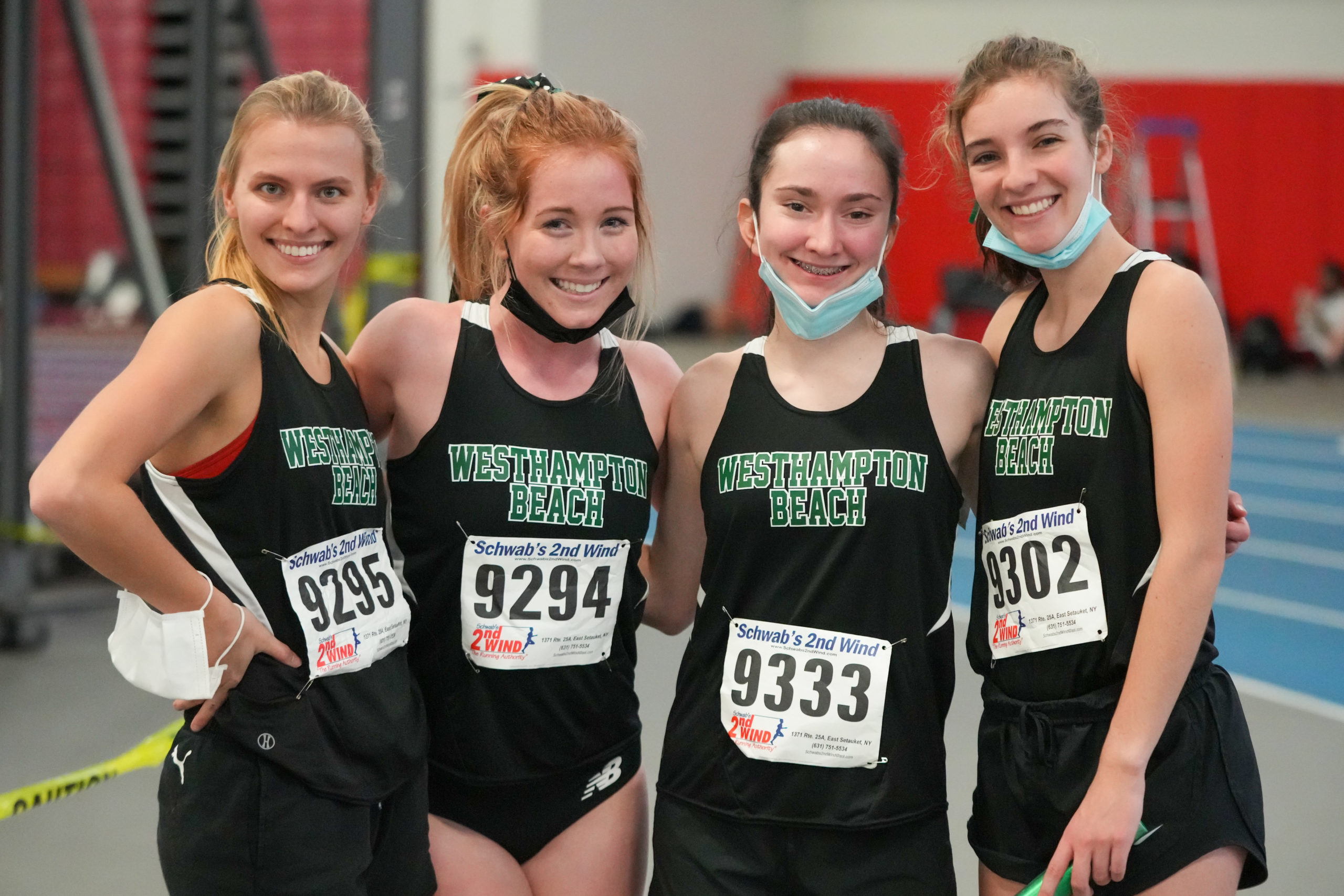 From left, Valerie Finke, Kiera Falvey, Lily Strebel and Rose Hayes, won and set a new school record in the distance medley relay at the Zeitler Relays on Saturday.