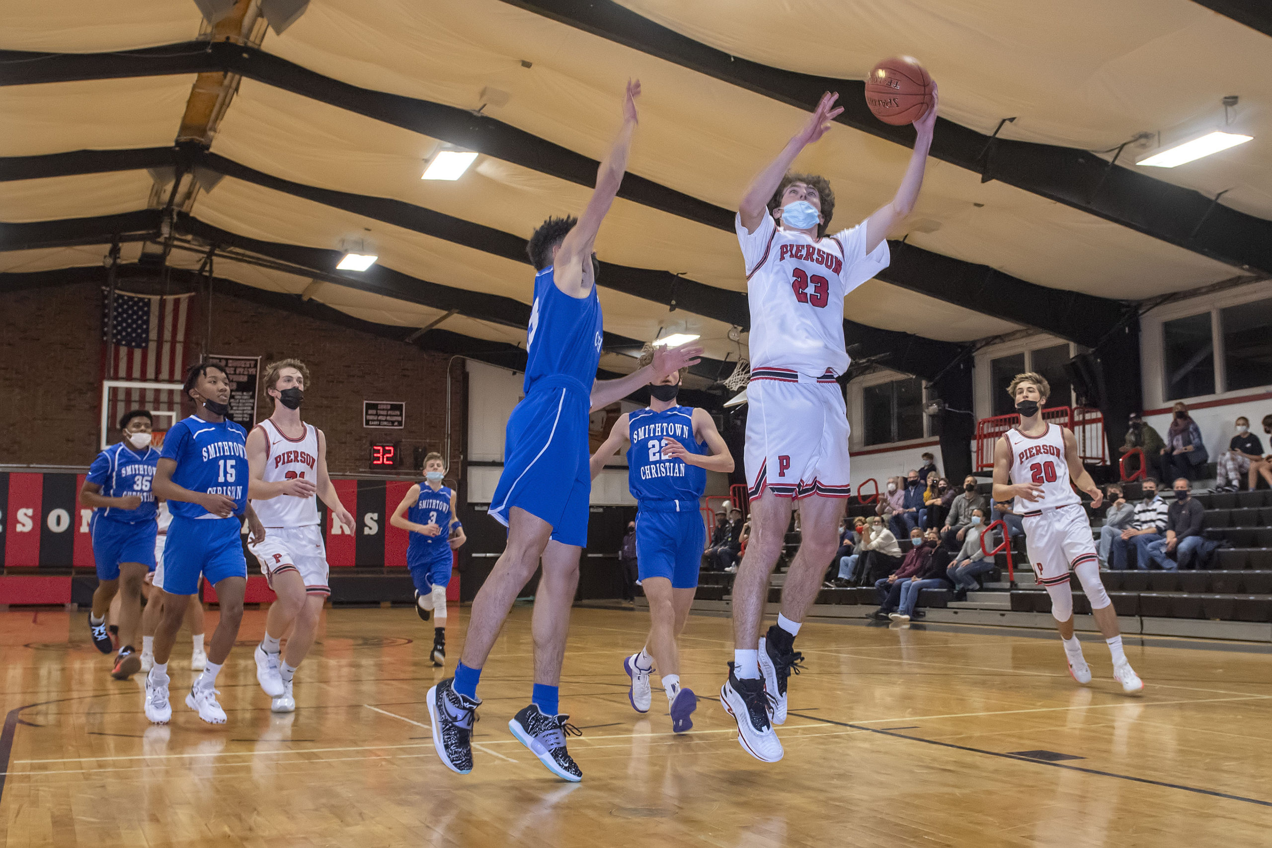 Charlie Culver driving to the basket in a game against Smithtown Christian earlier this season.