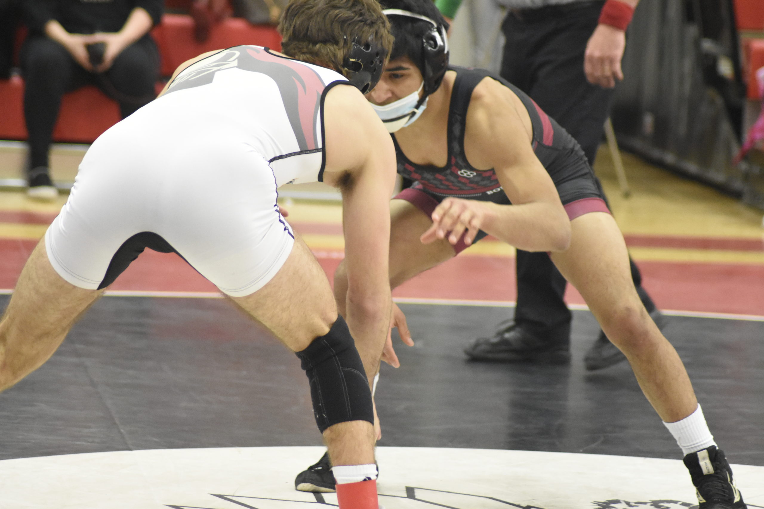 Bonac senior Caleb Peralta faced off against Vin Ziccardi of Kings Park for the 126-pound League V title on Saturday.