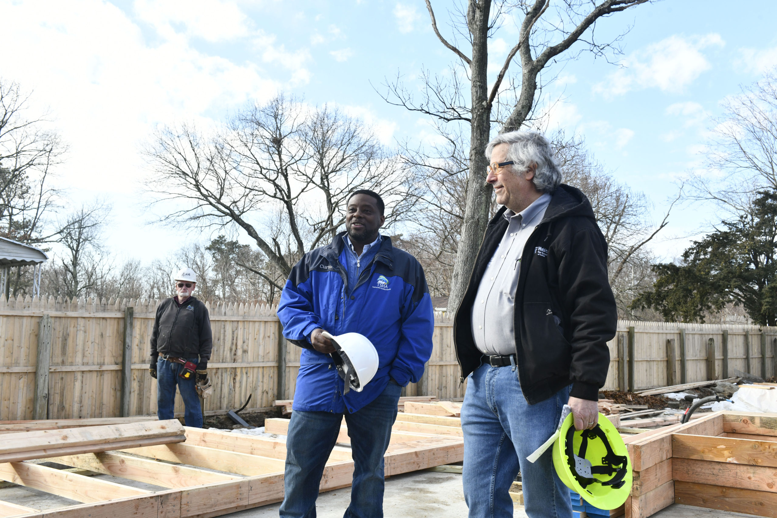 Habitat for Humanity of Suffolk Chief Executive Officer and Executive Director Lee Silberman with Curtis Highsmith,  the Housing Authority’s executive director.   DANA SHAW