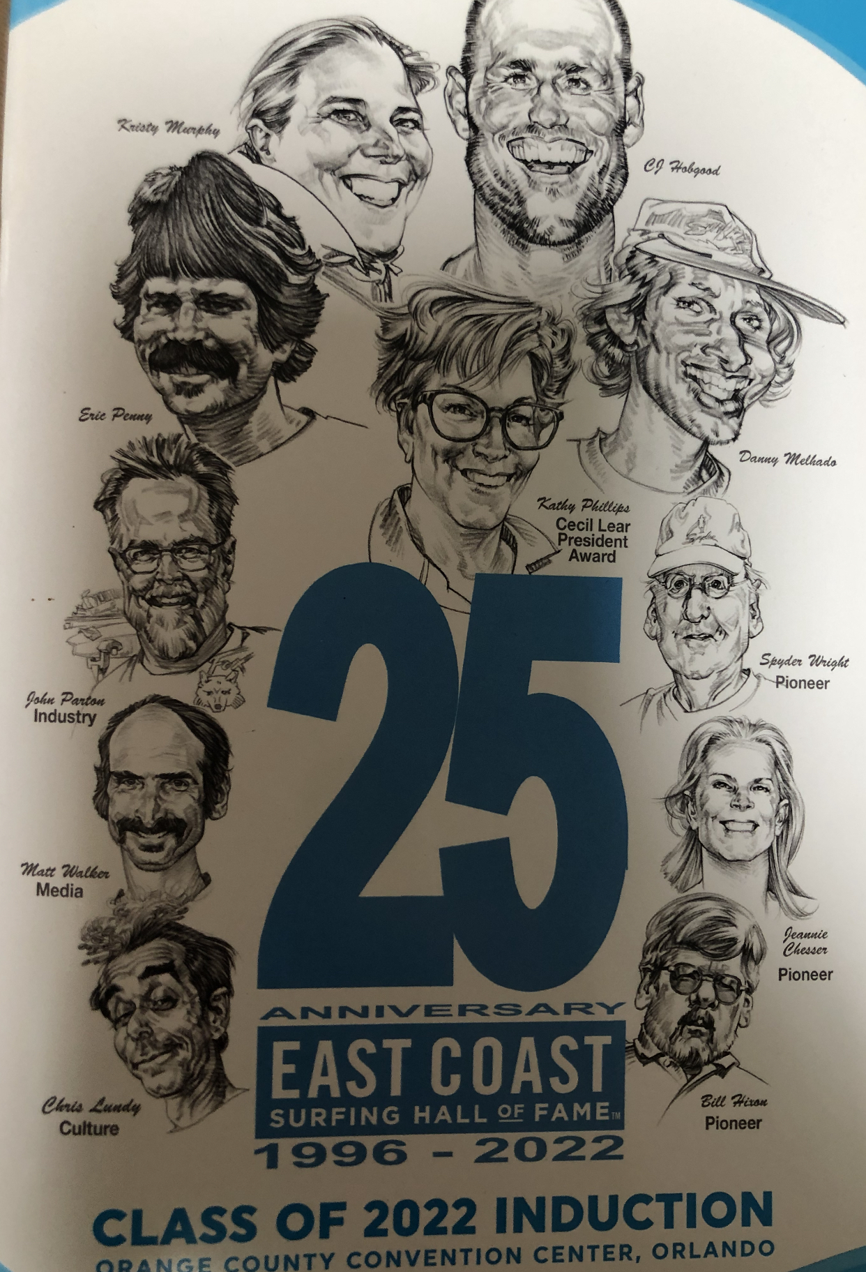 The cover of the program for the East Coast Surfing Hall of Fame, featuring Eric Penny.