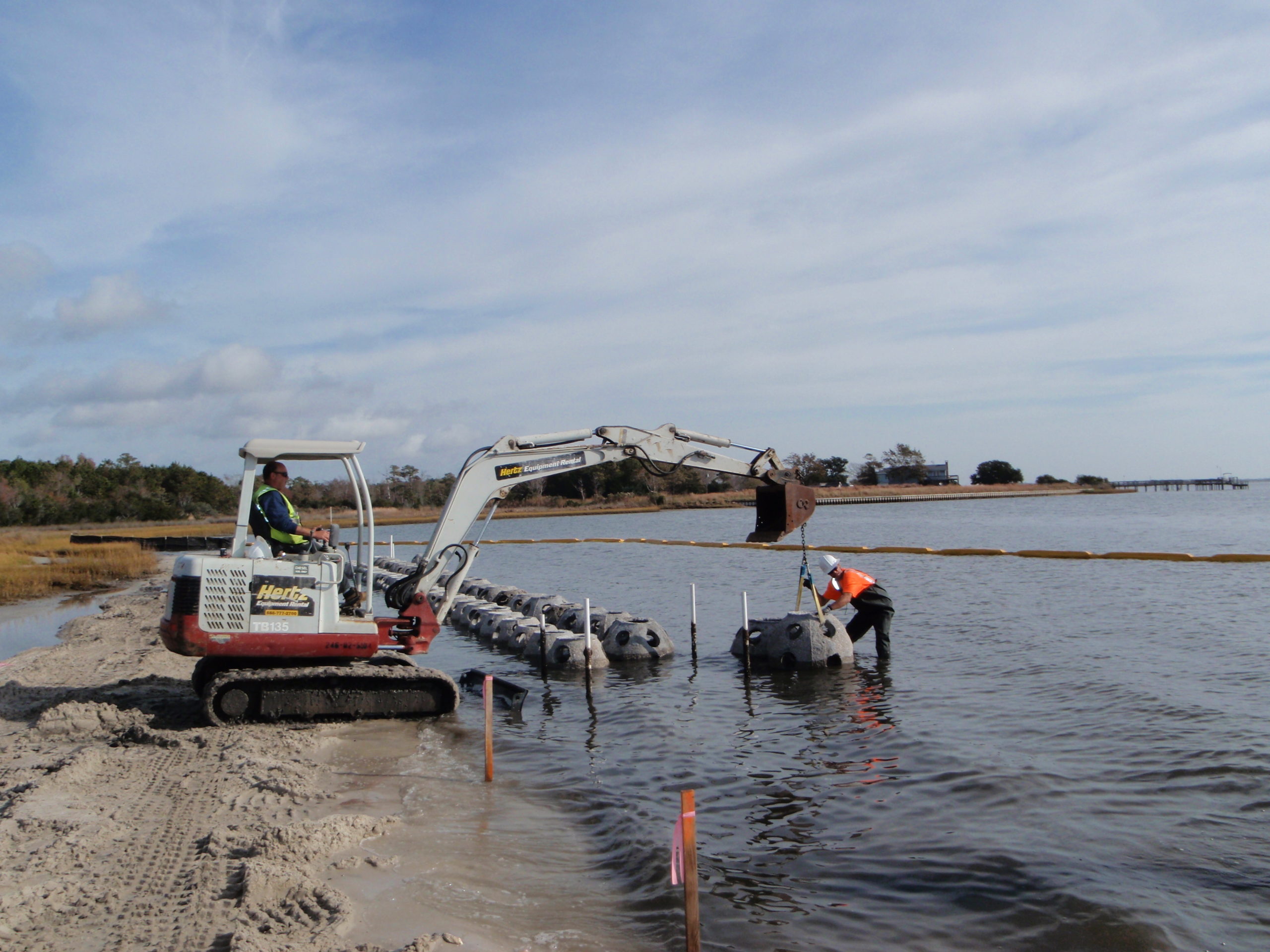 A 150-foot section of concrete oyster domes serves as the base for a newly constructed living shoreline, adding to the large shoreline and marsh restoration project at Morris Landing across from North Topsail Beach.