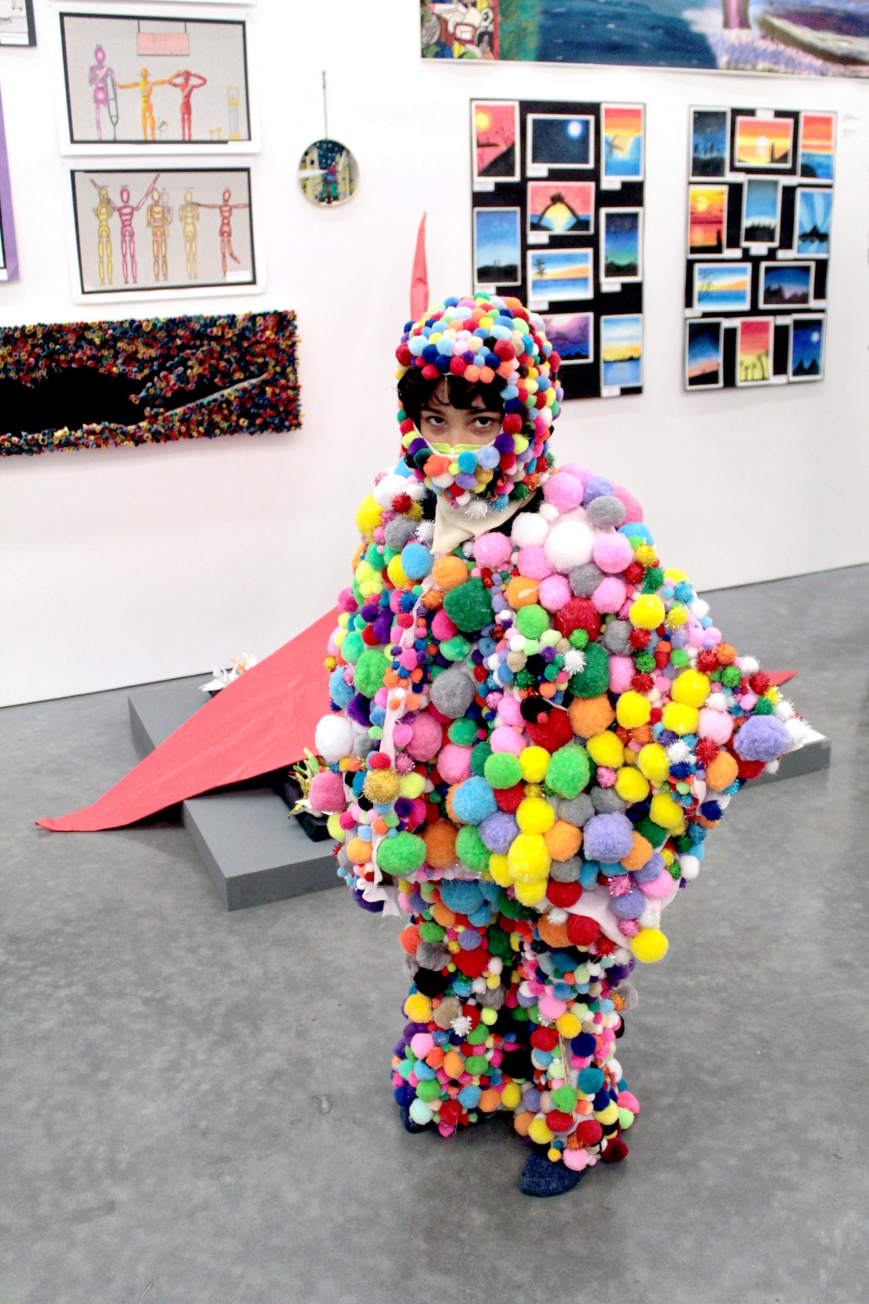 Child in a wearable sculpture created by students at the Hayground School. TOM KOCHIE