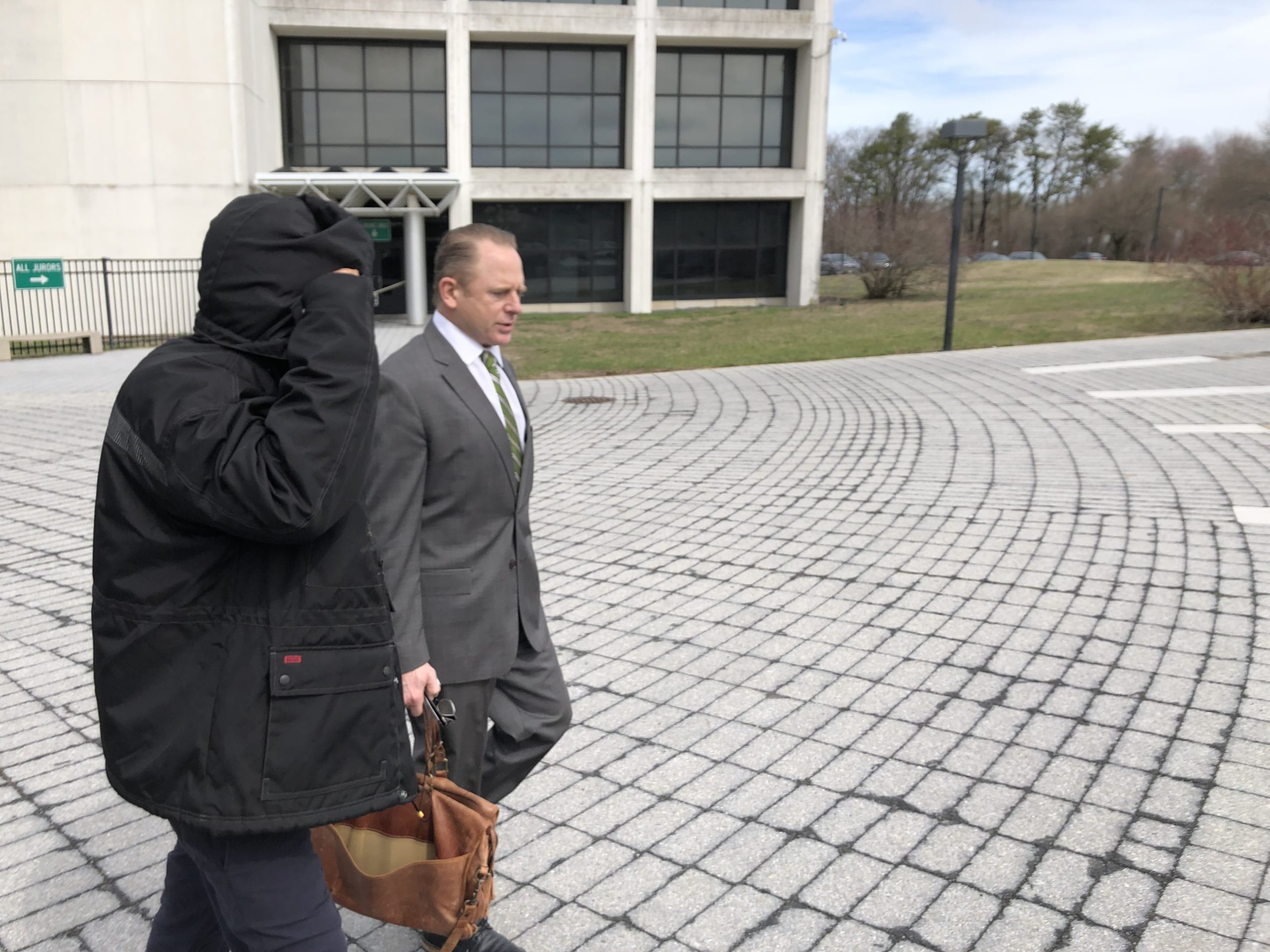 Jay Rowe with his attorney, Colin Astarita, at the courthouse on Friday. T. E. McMorrow