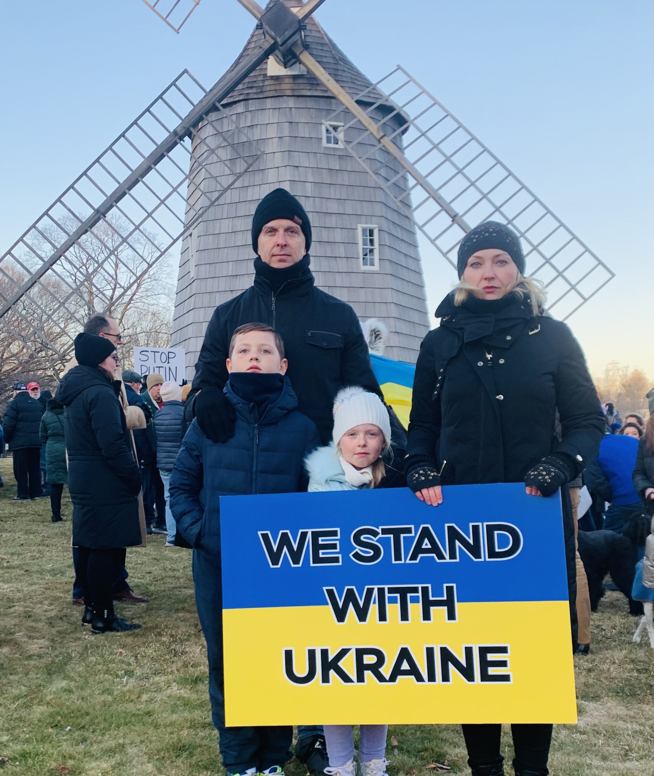 Natalie Massa, right, with her husband, James, and their children, Zayden and Violet, at a rally in support of Ukraine last Thursday in East Hampton.