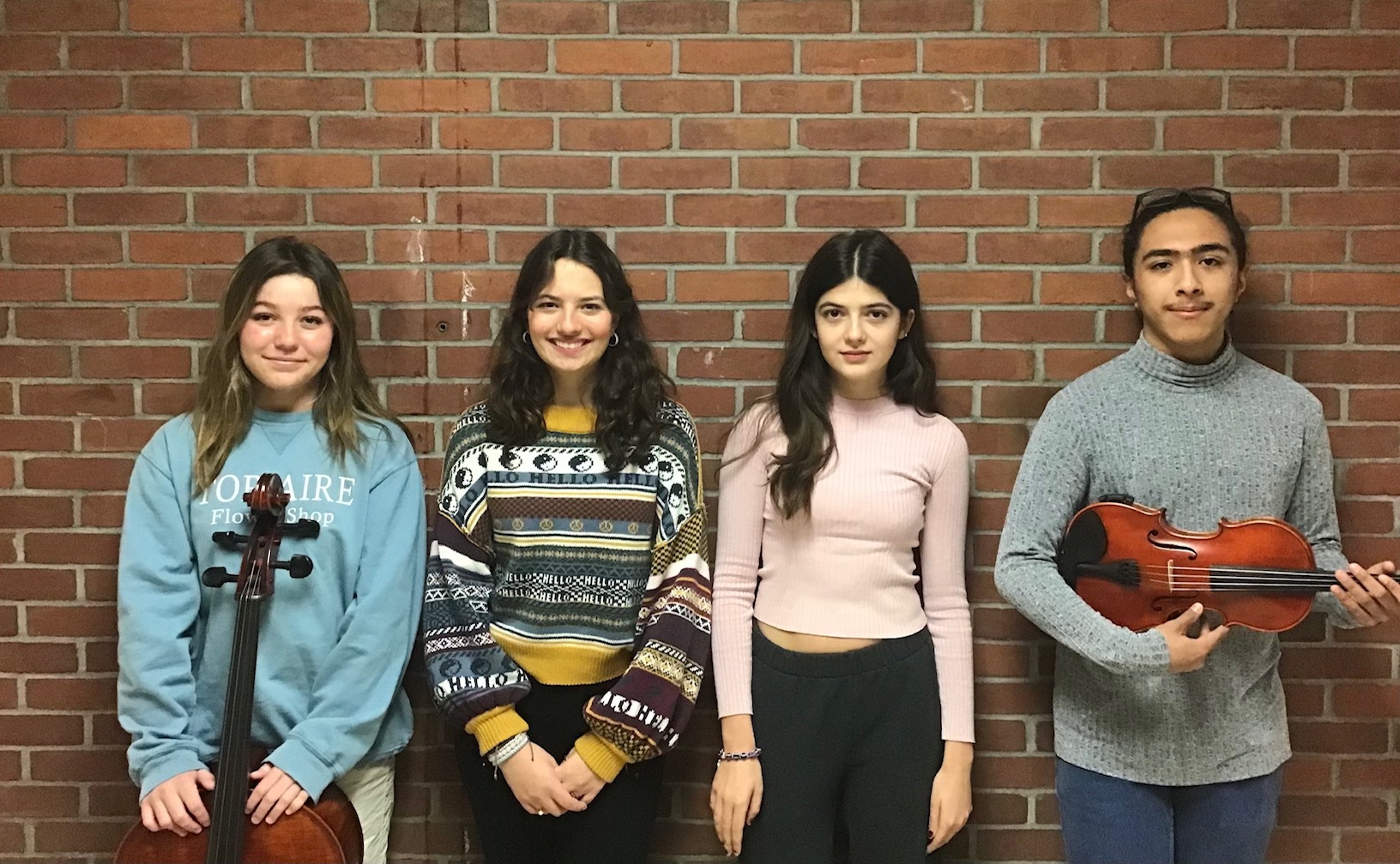 Southampton High School students, from left, Katie Terry, Xanthi Lazarakis, Beatriz Fino Morfogen and Casey Cartagena recently performed in the SCMEA All-County Music Festival.