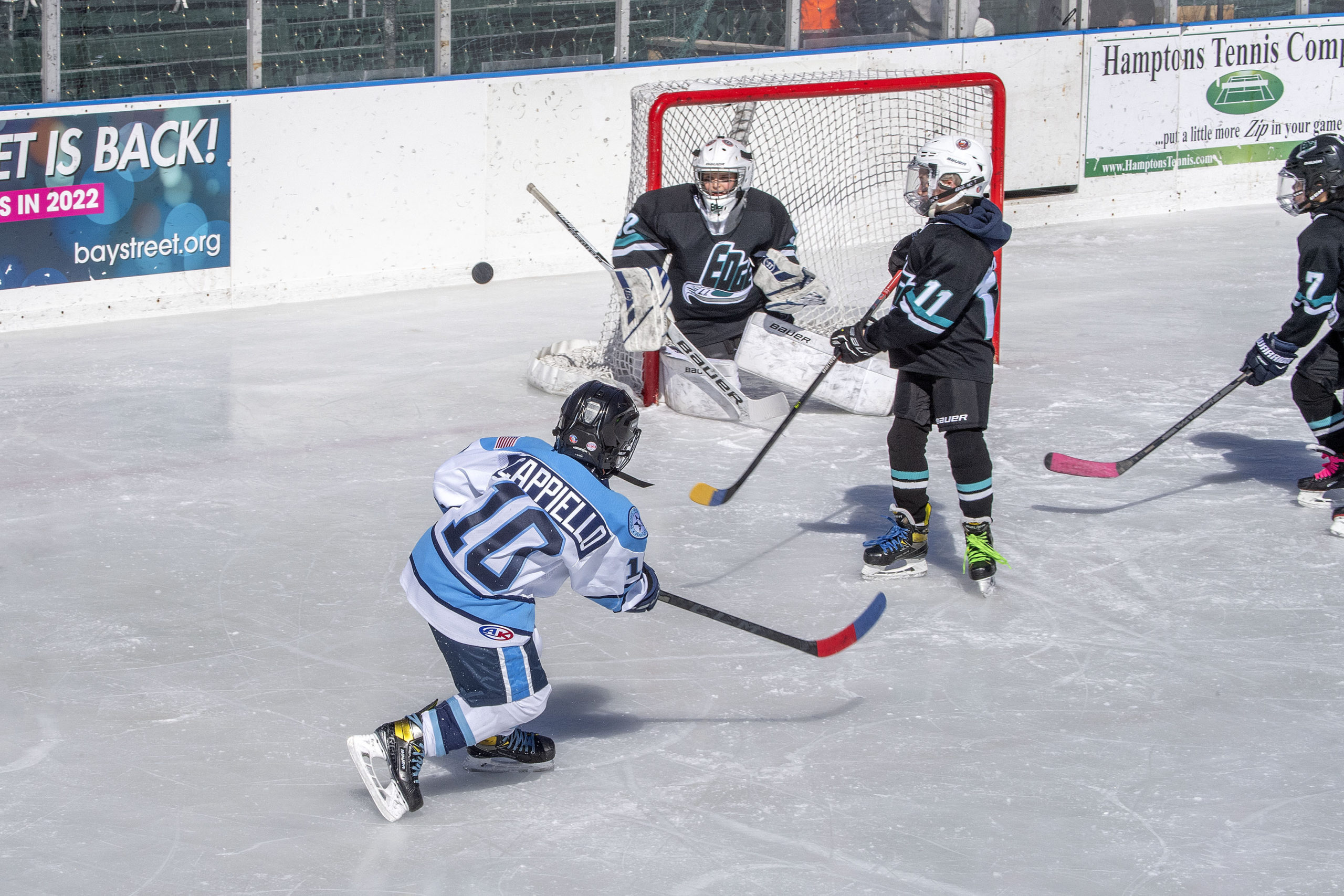 Anthony Cappiello takes a shot during the 10U Wildcats game on Sunday. MICHAEL HELLER