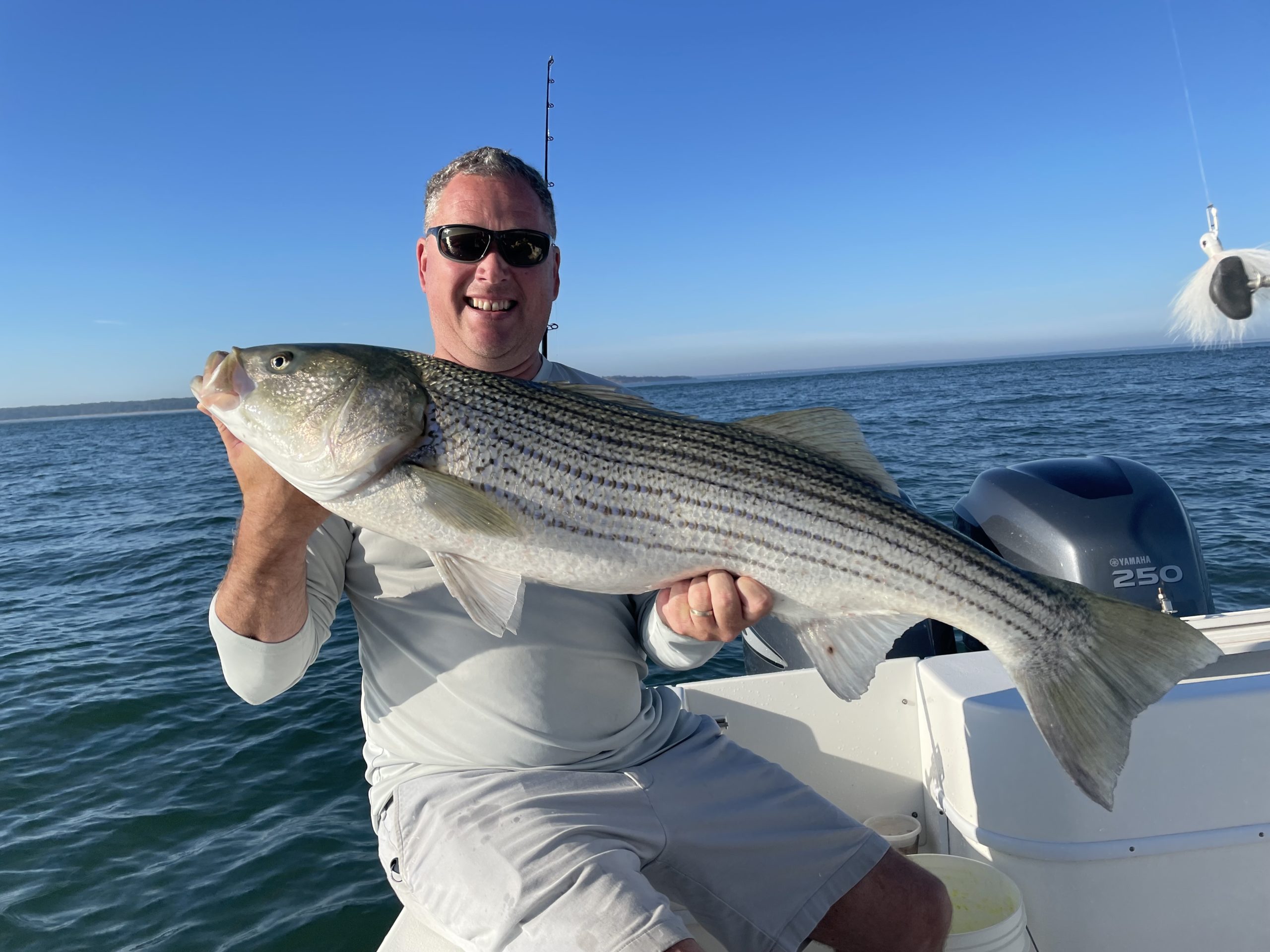 Anglers can offer input on the management of striped bass, like this one caught by Keith Robertson last summer, until April 15.