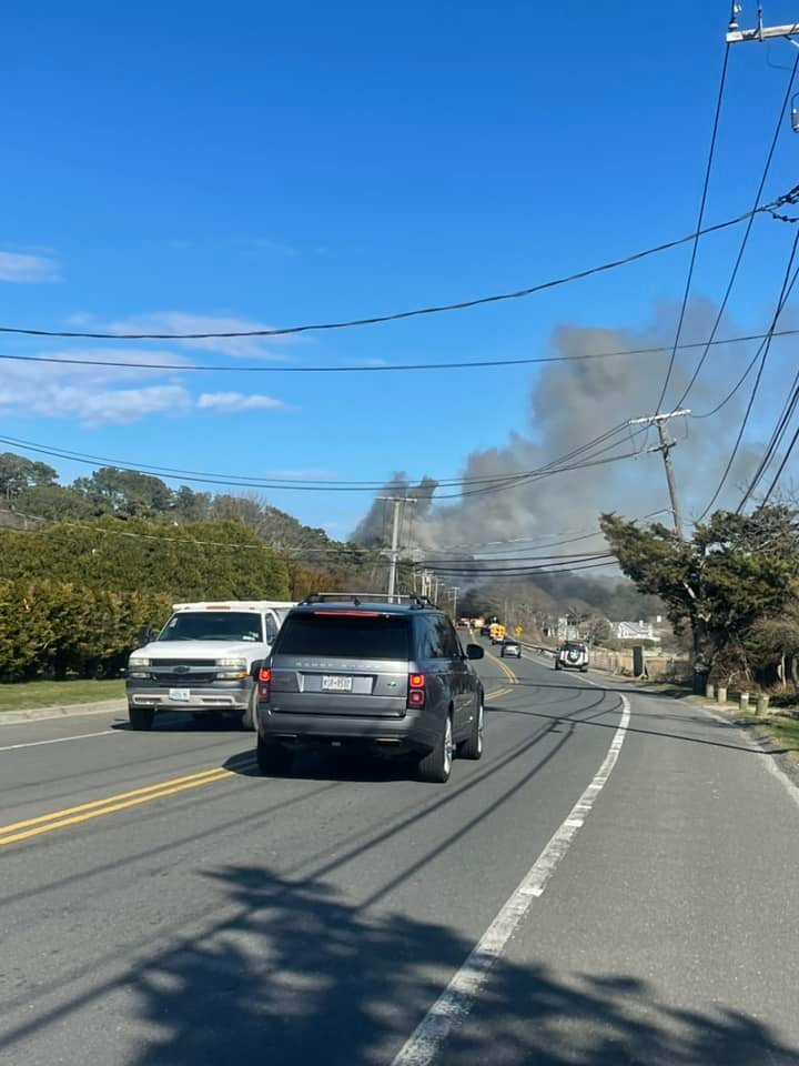 Smoke billowed from a fire on East Montauk Highway  in Shinnecock Hills Friday afternoon.     DONALD FLANNERY