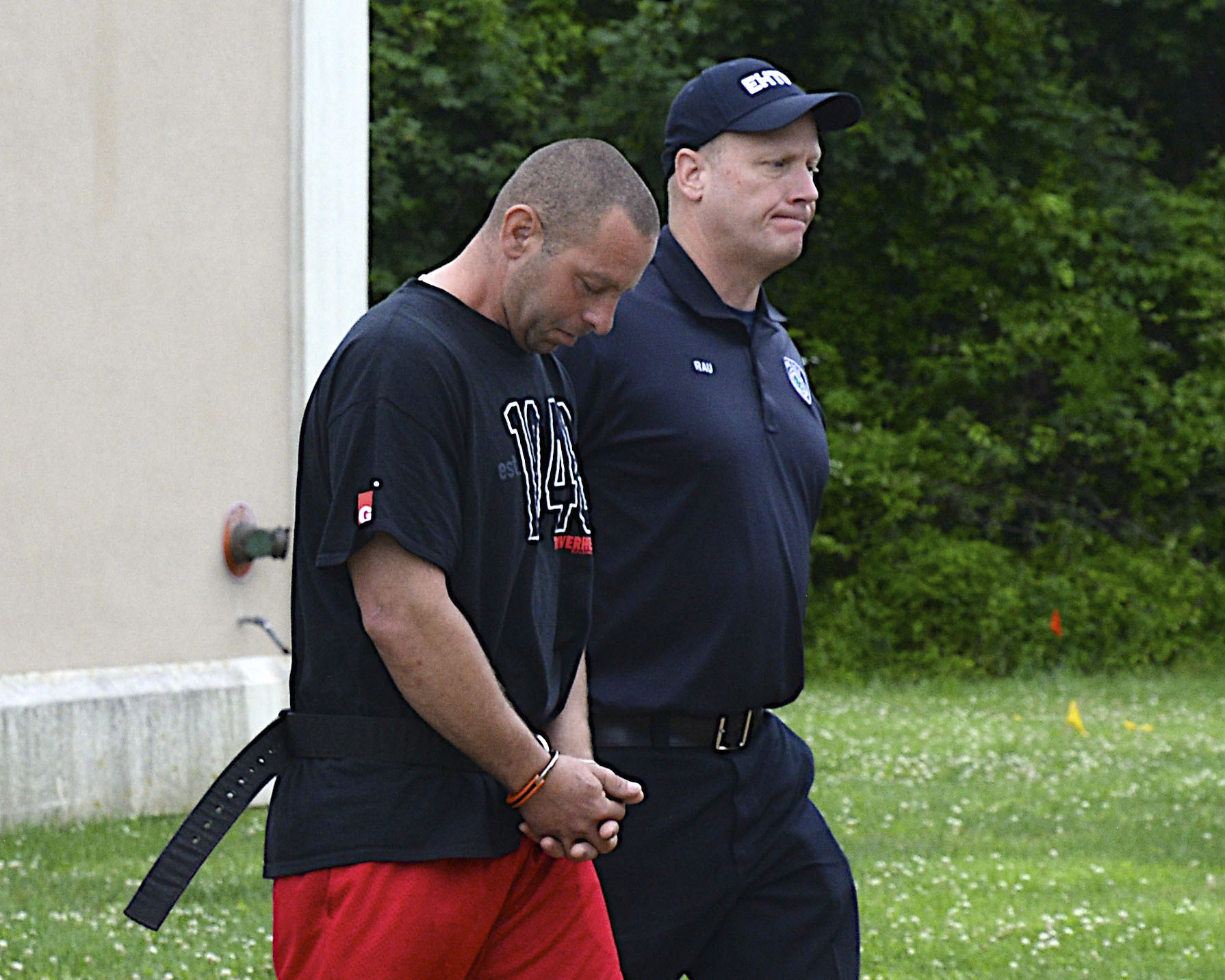 Joseph Grippo being led to his arraignment in June of 2019.    KYRIL BROMLEY