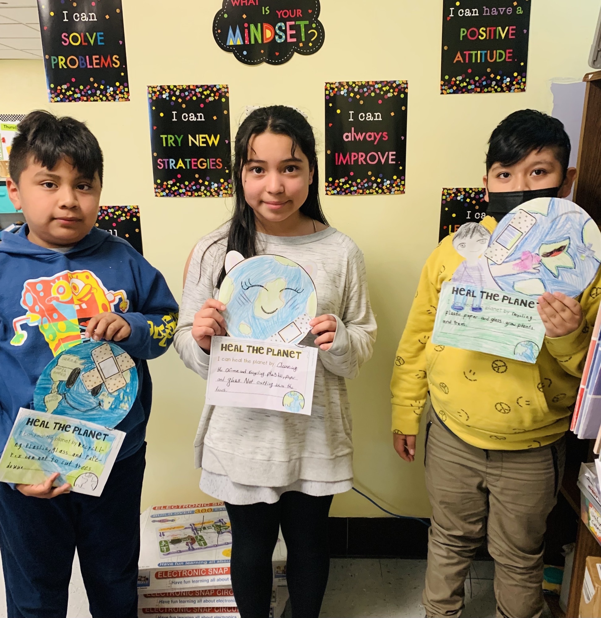 To mark Earth Day, Hampton Bays Elementary School fourth graders in Krista Savino’s class discussed and wrote about different ways that they can help heal the planet and solve issues such as pollution and litter. COURTESY HAMPTON BAYS SCHOOL DISTRICT
