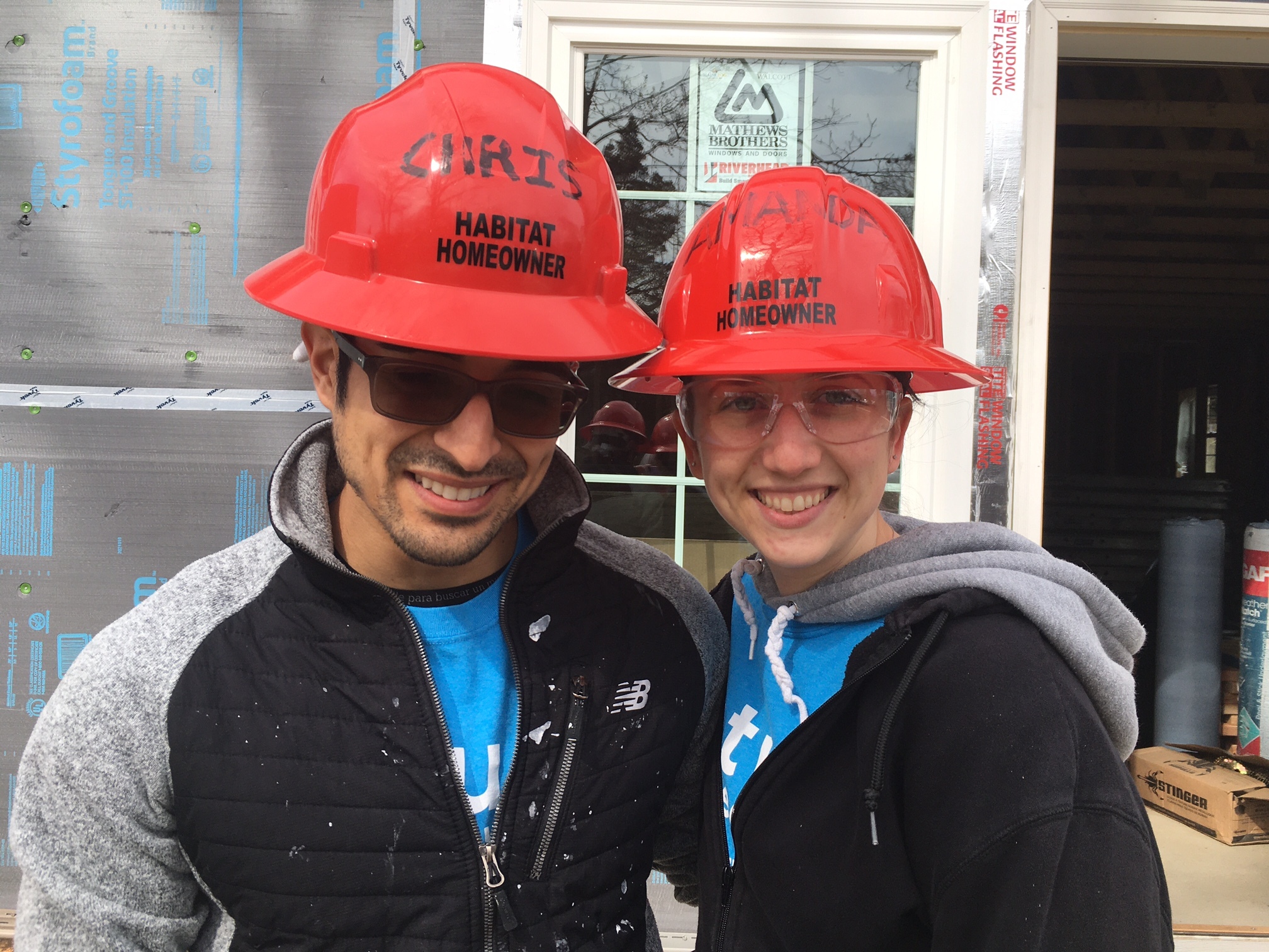 Chris and Amanda Hoyos worked on their Habitat for Humanity house last weekend. The land for the development was procured through the county's 72-H program.           KITTY MERRILL