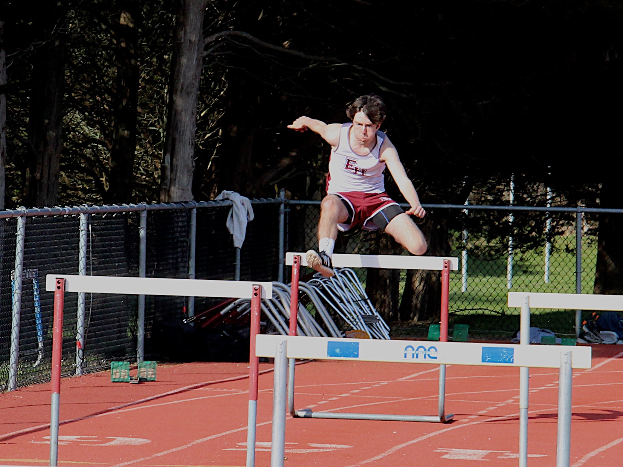Liam Fowkes competes in the hurdles for East Hampton.    KYRIL BROMLEY
