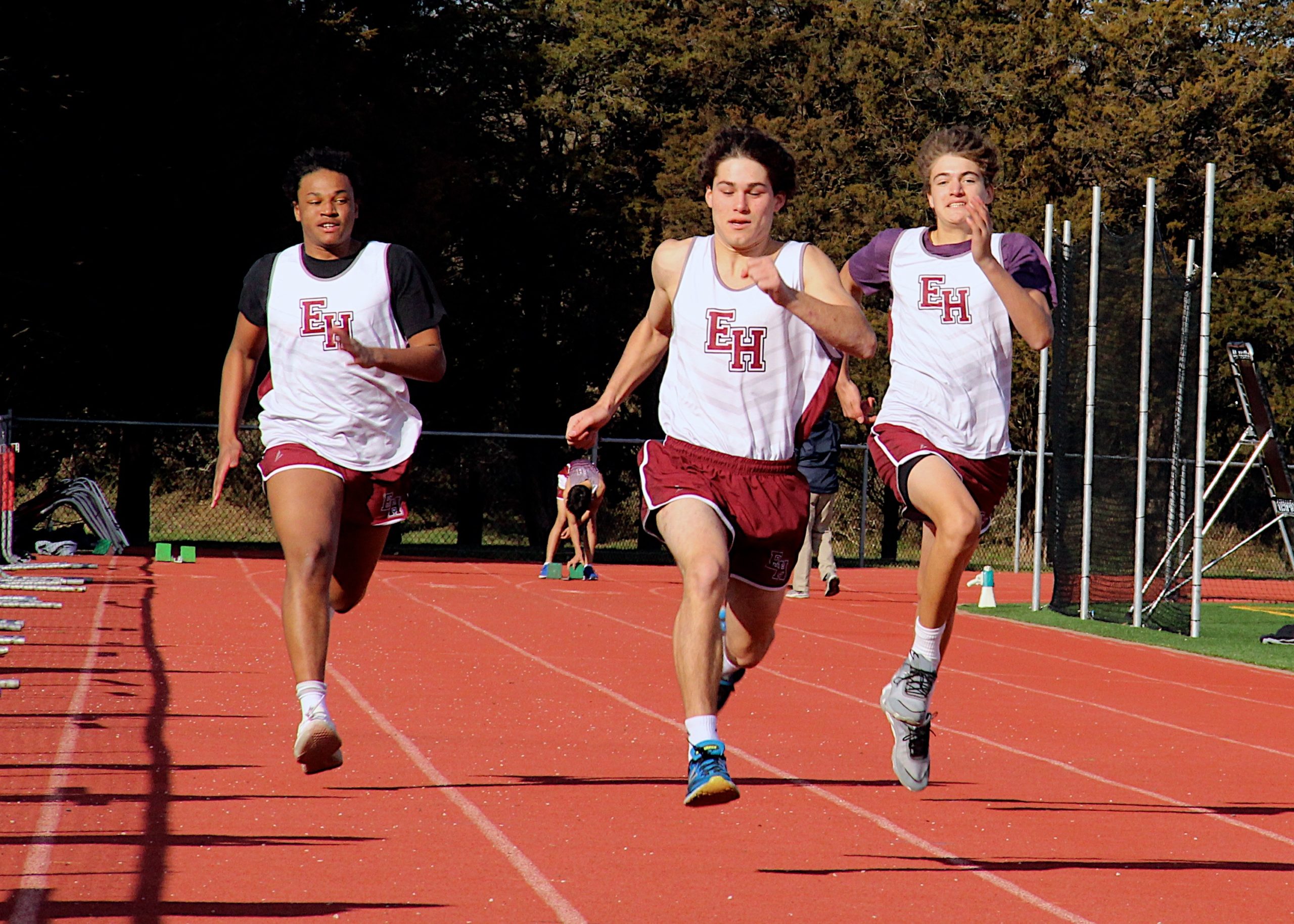 Pierson's Irving Desir, East Hampton's Dante Sasso and Pierson's Luke Winenga compete in a race on Monday.   KYRIL BROMLEY