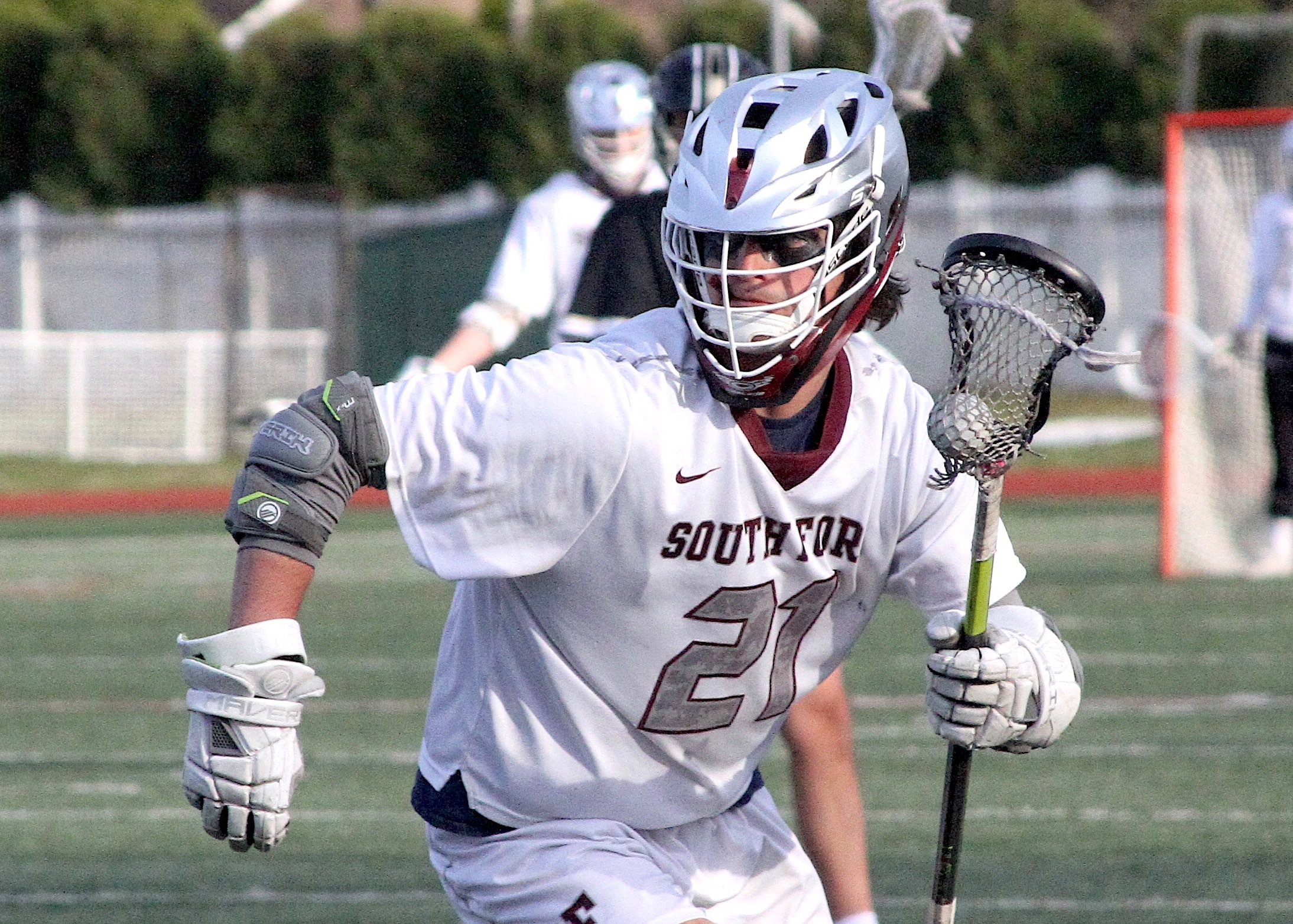 Sophomore midfielder Jack Cooper won all but three faceoffs for the South Fork boys lacrosse team in an 11-7 loss to Sachem North April 25. DESIRÉE KEEGAN