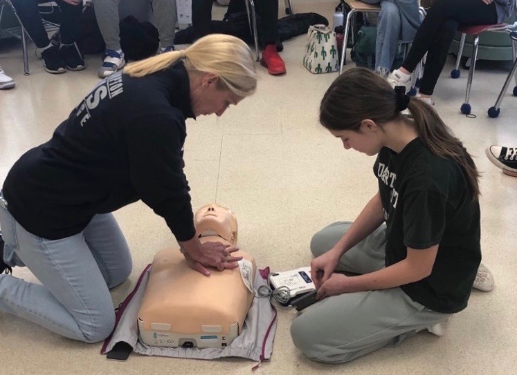 Eighth graders in Christina Duryea’s home and careers class at Southampton Intermediate School were recently certified in CPR and first aid through instruction provided by Joe Hurley of the Southampton Village Volunteer Ambulance. They learned how to properly perform the Heimlich maneuver and chest compressions and operate an AED on adults and children. They also learned how to address abrasions and lacerations and how to stop a bleed. COURTESY SOUTHAMPTON SCHOOL DISTRICT