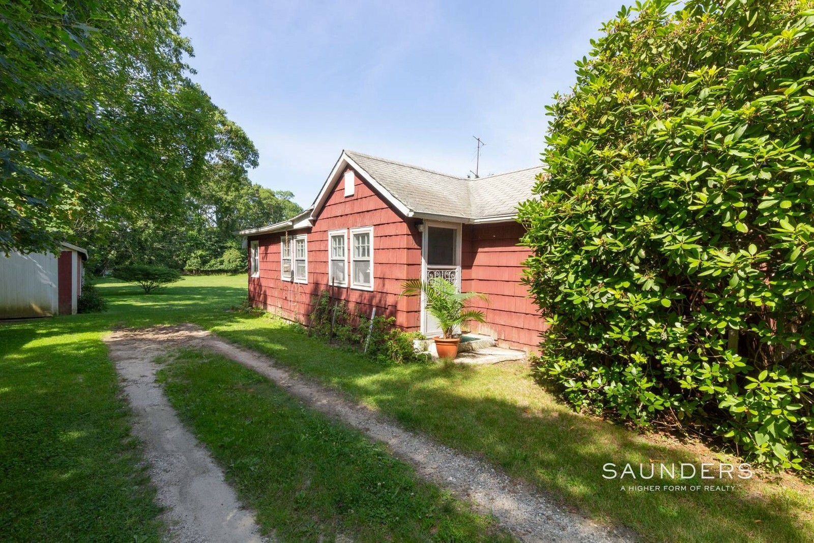 This 962-square-foot Southampton cottage is currently under contract, with a last listed price of $645,000. COURTESY SAUNDERS & ASSOCIATES