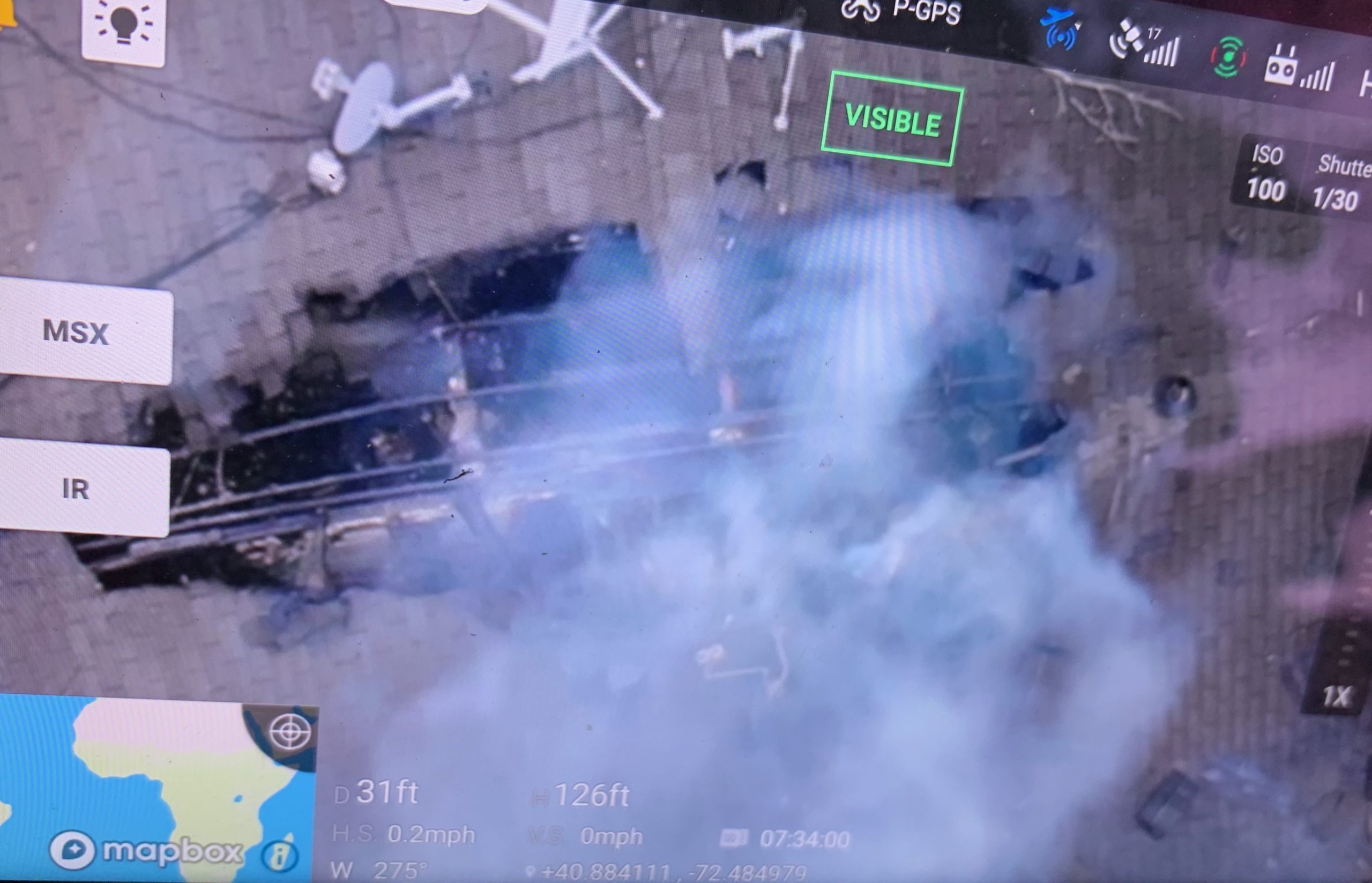 Smoke poured from the gaping hole in the roof, as seen from a drone during the Friday afternoon fire on East Montauk Highway in  Hampton Bays. COURTESY HAMPTON BAYS FIRE DEPARTMENT