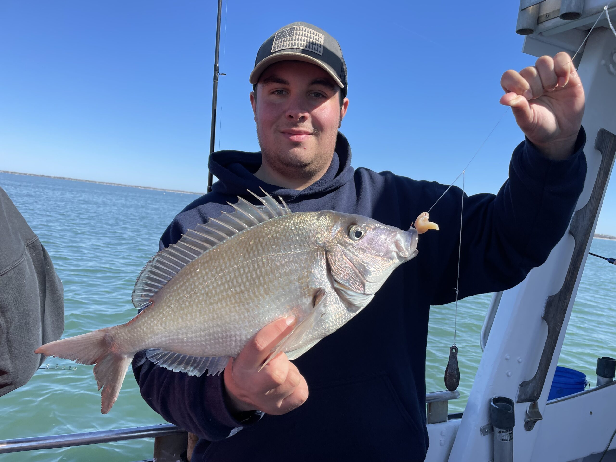 Chris Brenner Jr. with a 3-pound, 6-ounce porgy caught aboard the Shinnecock Star in Peconic Bay.