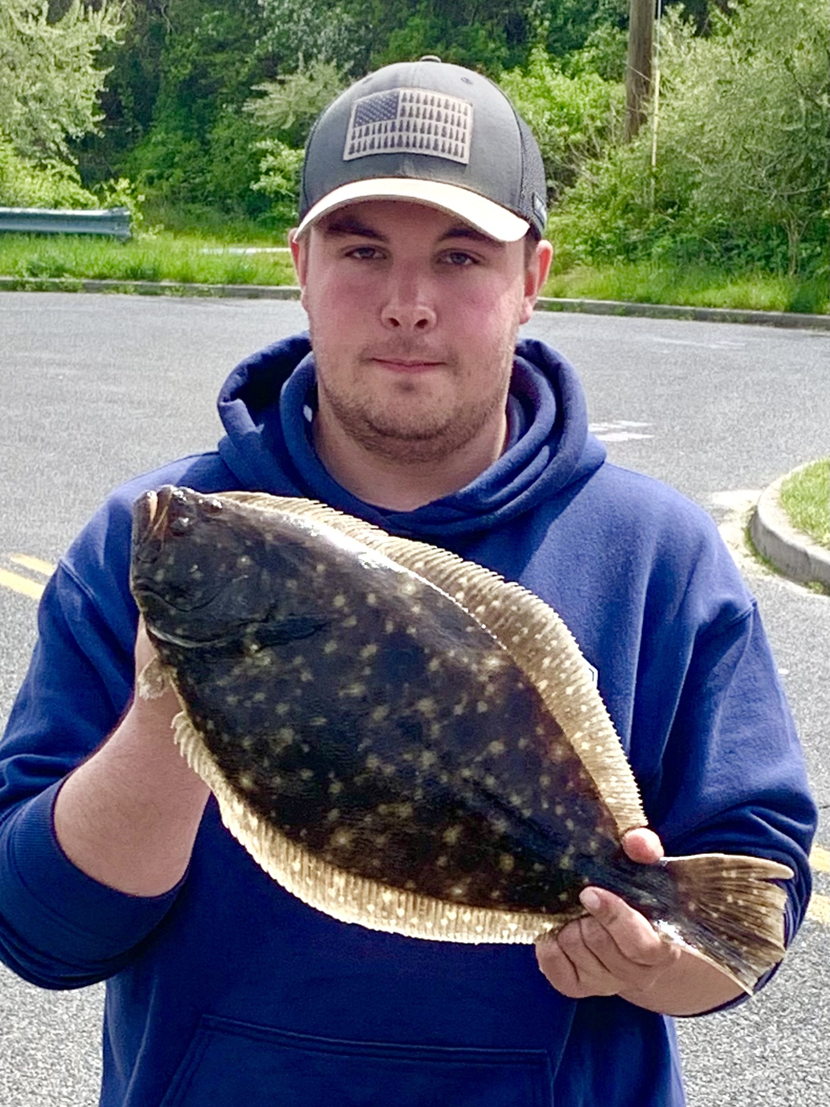 Chris Brenner Jr. with a nice keeper fluke from the Shinnecock Canal.