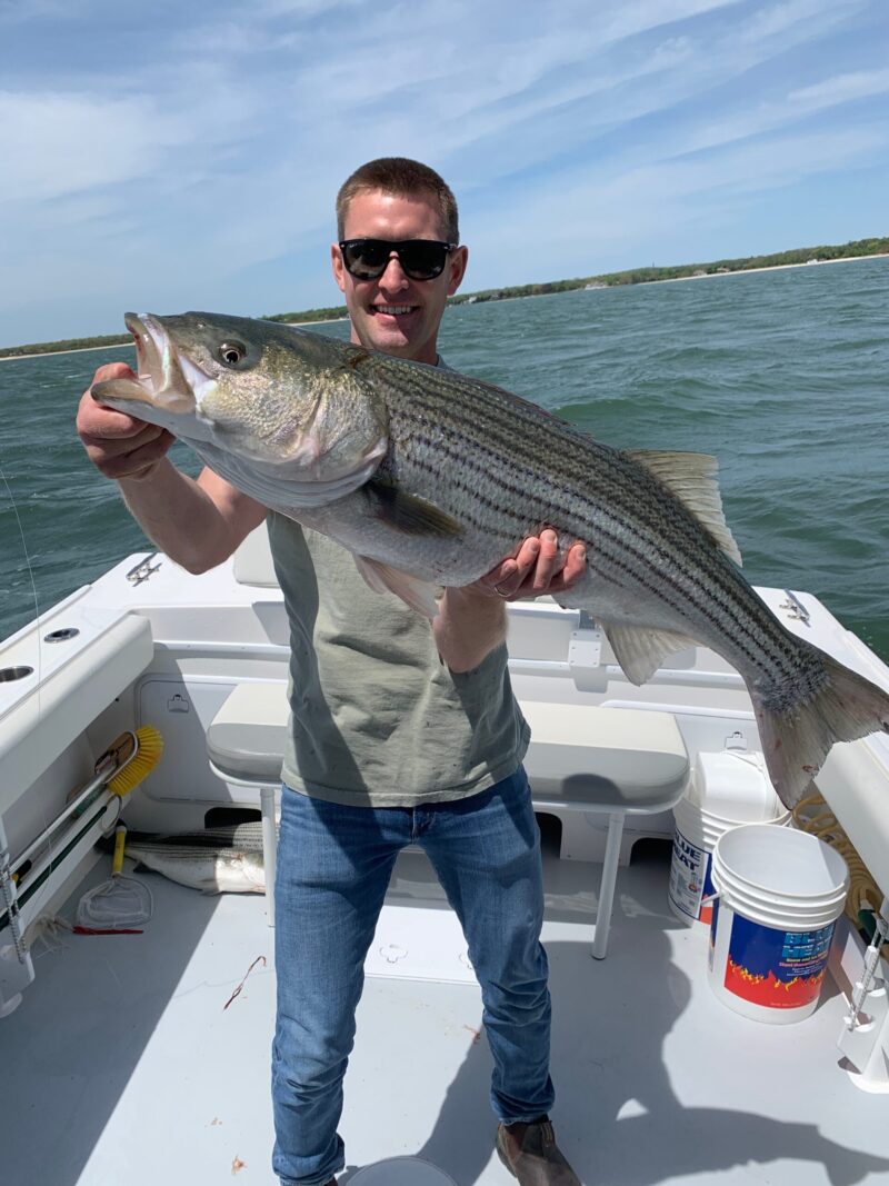 Dean Hagerman with a nice striped bass caught in the Peconics recently. The bays and ocean have both been stacked with striped bass plenty early this spring.