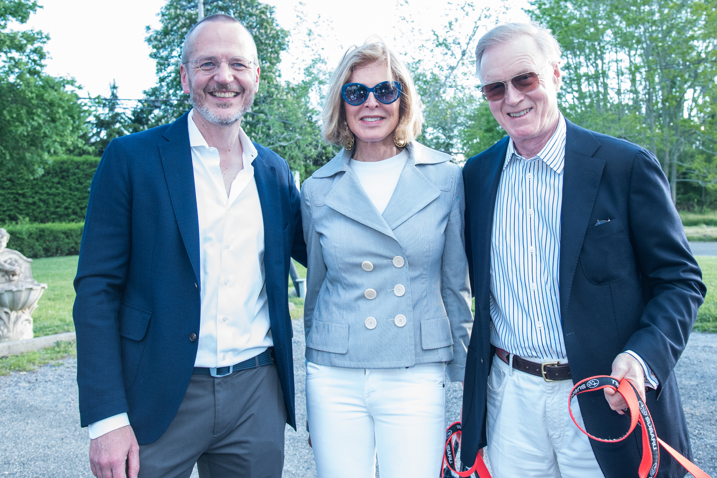 ARF Executive Director Scott Howe with Ellen and Chuck Scarborough at the Animal Rescue Fund of the Hamptons preview cocktail party for the benefit designer auction on Saturday evening at the ARF Thrift & Treasure Shop in Sagaponack. The online auction will run through June 7 and feature furniture and decorative items for the home donated by longstanding friends and ARF supporters, including some of the most admired designers, artisans, and dealers in the country.  LISA TAMBURINI