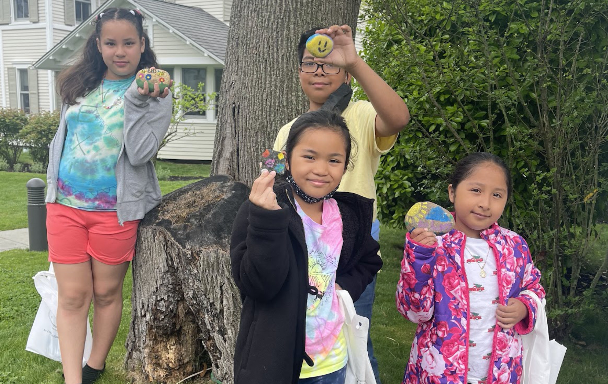 Bridgehampton School students, from left, Arianna Verzosa, Jeffrey Soto, Ashli Reyes and Asucena Ramos with their Scribble Stones, which they made after reading Diane Alber’s “Scribble Stones,” a heartwarming story about a little stone that was able to spread kindness to the world. Inspired by the story, they decorated stones with positive pictures and kind messages to place around the Bridgehampton community on a walking field trip. Students
carefully selected spots through hamlet where they thought their joyful stones would be seen by the most people and spread the most happiness. COURTESY BRIDGDEHAMPTON SCHOOL DISTRICT
