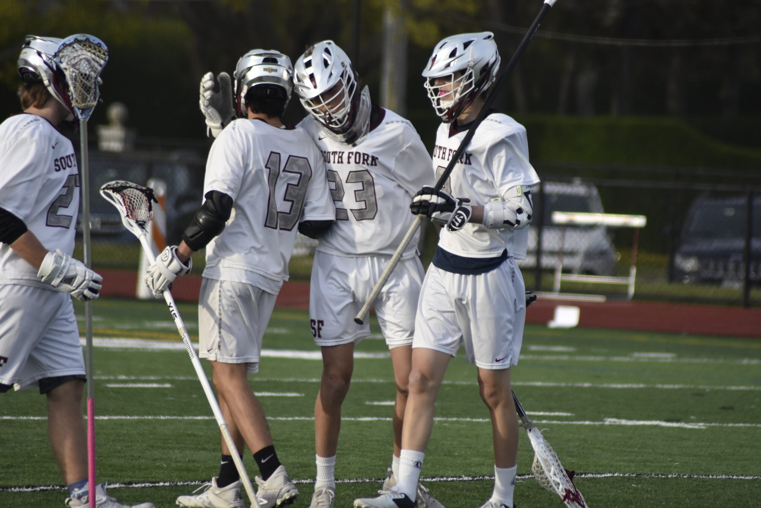 South Fork goalie Stephen Sutton gets congratulated by teammates after their 14-3 victory over North Babylon on Thursday, May 5.     DREW BUDD