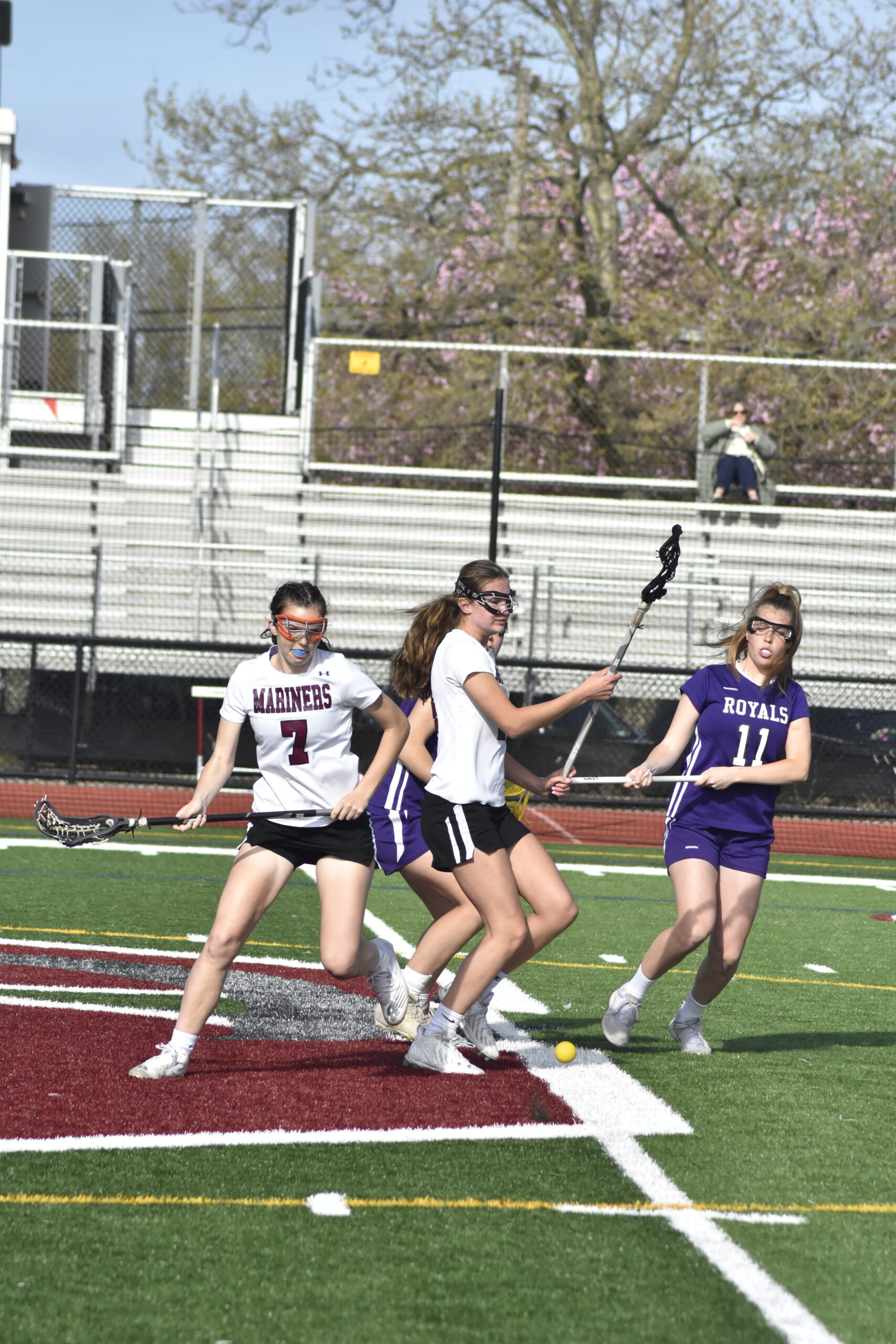 Mariners Hailey Cameron and Juliette Archer go after a loose ball off a faceoff.   DREW BUDD